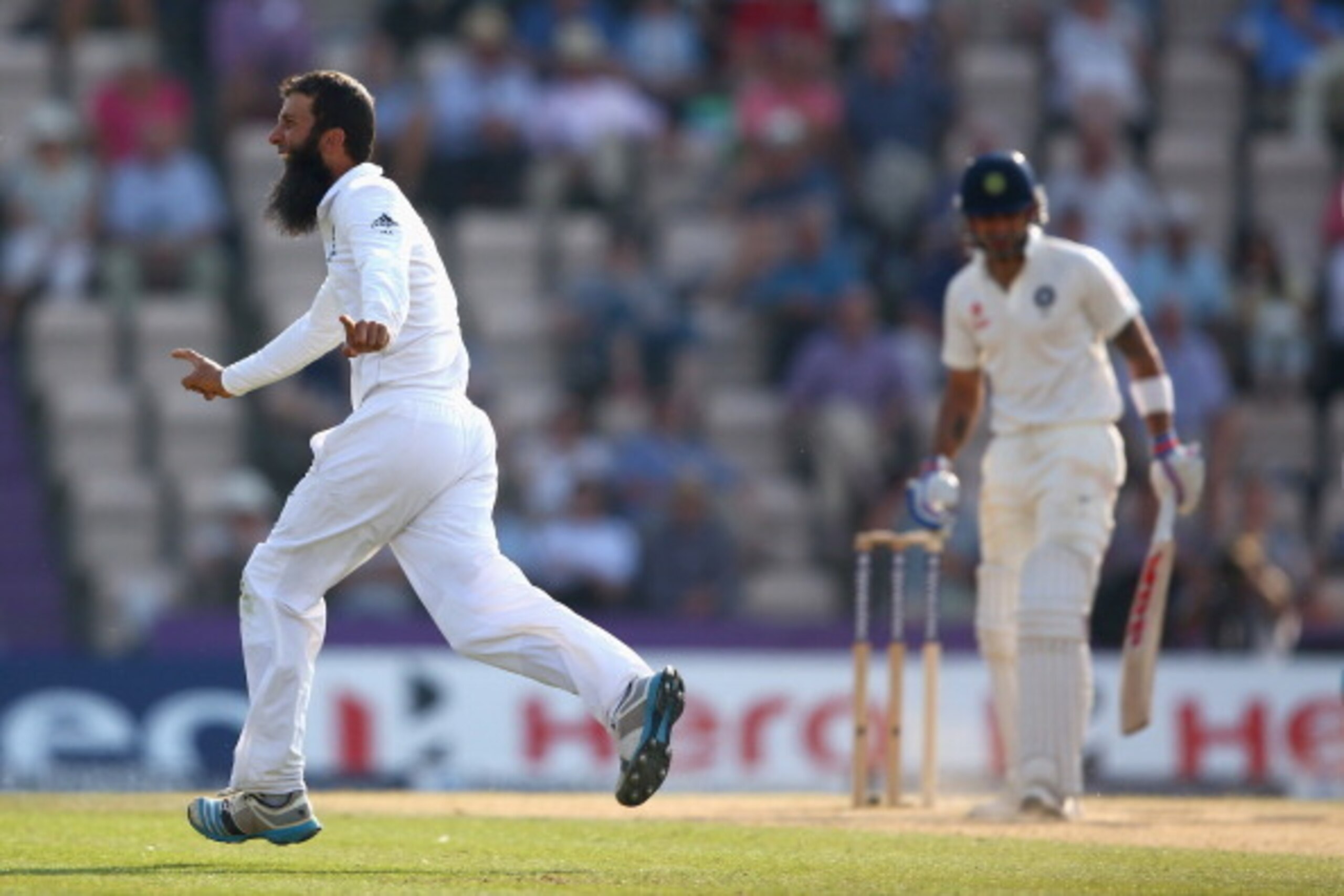SOUTHAMPTON, ENGLAND - JULY 30:  Moeen Ali of England celebrates capturing the wicket of Virat Kohli of India during day four of the 3rd Investec Test match between England and India at the Ageas Bowl on July 30, 2014 in Southampton, England.  (Photo by M