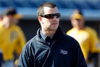 PORT CHARLOTTE, FL - MARCH 25:  Executive Vice President of Baseball Operations Andrew Friedman of the Tampa Bay Rays watches batting practice just before the start of the Grapefruit League Spring Training Game against the Pittsburgh Pirates at the Charlo