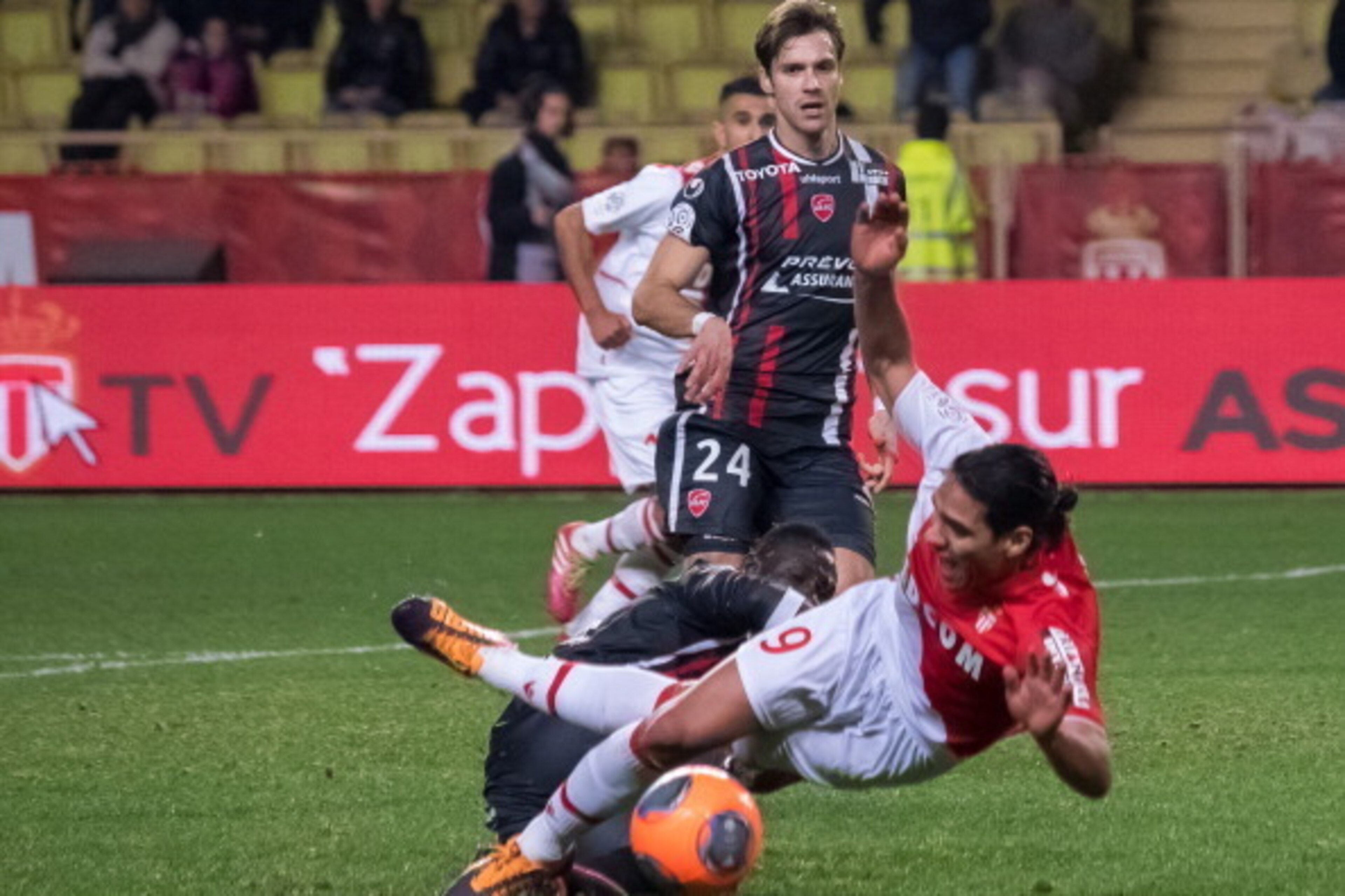 MONTE-CARLO, MONACO - DECEMBER 20: Monaco's foward Radamel Falcao (R) obtains a penalty on Valenciennes's defender Saliou Ciss (L) during the French L1 football match between AS Monaco vs Valenciennes at Louis II Stadium on December 20, 2013 in Monte-Ca MONTE-CARLO, MONACO - DECEMBER 20: Monaco's foward Radamel Falcao (R) obtains a penalty on Valenciennes's defender Saliou Ciss (L) during the French L1 football match between AS Monaco vs Valenciennes at Louis II Stadium on December 20, 2013 in Monte-Ca