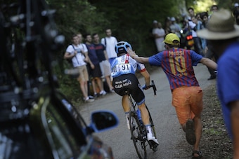 Alone but for the Garmin support car and spectators, Talansky is urged on during his attempts to complete Stage 11.