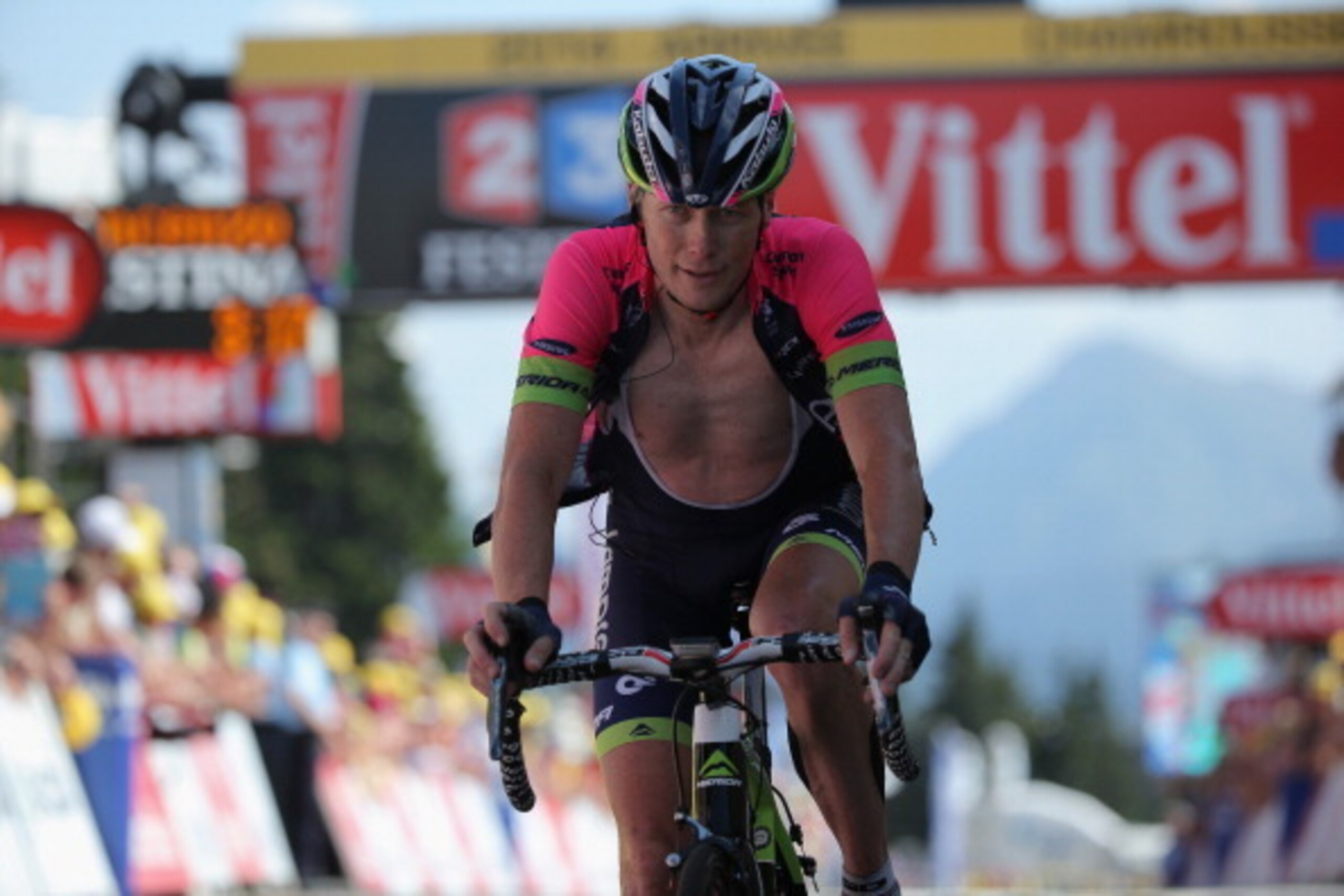 CHAMROUSSE, FRANCE - JULY 18:  Chris Horner of the United States and Lampre-Merida arrives at the finish line in 17th place during the thirteenth stage of the 2014 Tour de France, a 197km stage between Saint-Etienne and Chamrousse, on July 18, 2014 in Cha