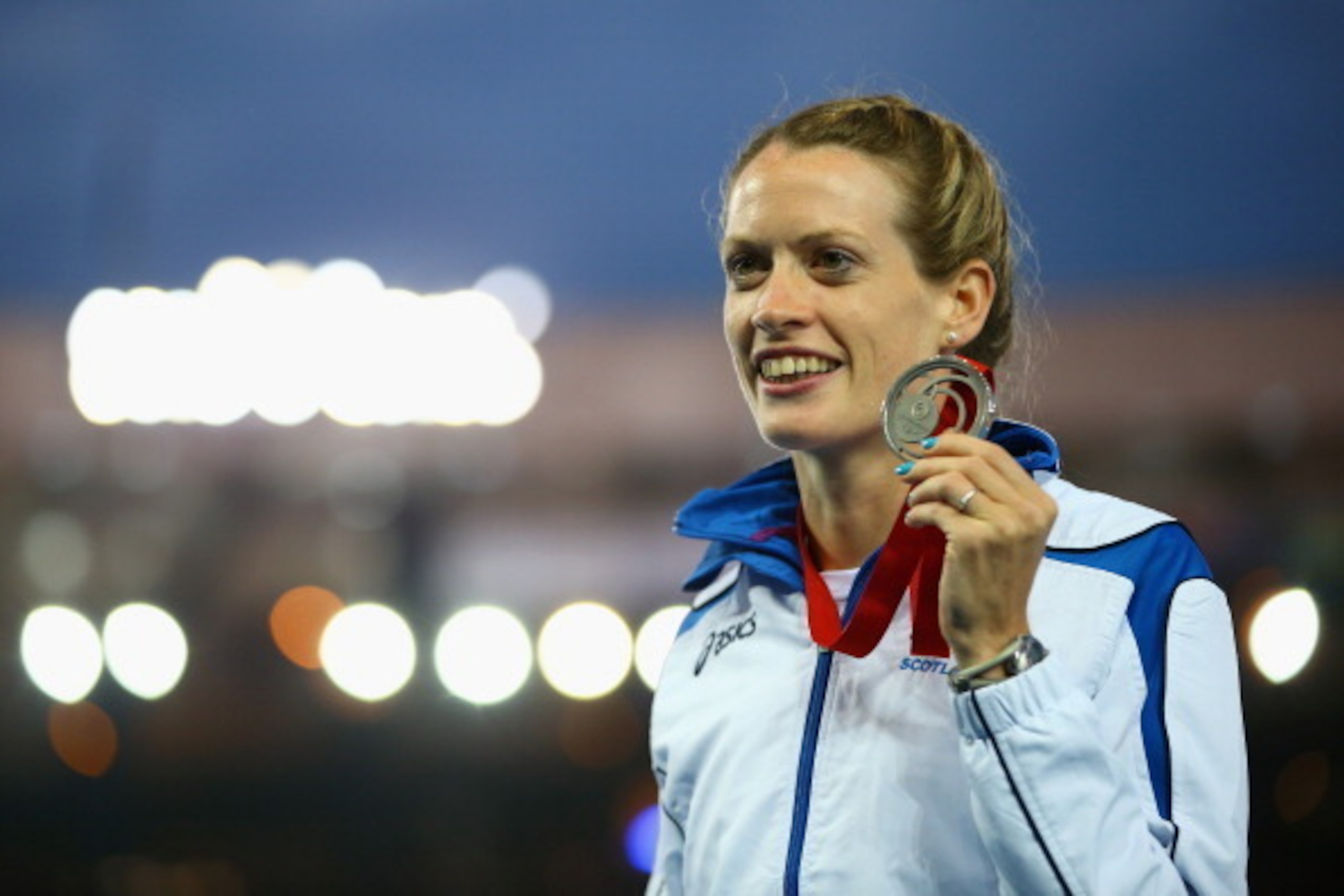 GLASGOW, SCOTLAND - JULY 31:  Silver medallist Eilidh Child of Scotland on the podium during the medal ceremony for the WomenÂs 400 metre hurdles at Hampden Park during day eight of the Glasgow 2014 Commonwealth Games on July 31, 2014 in Glasgow, United K