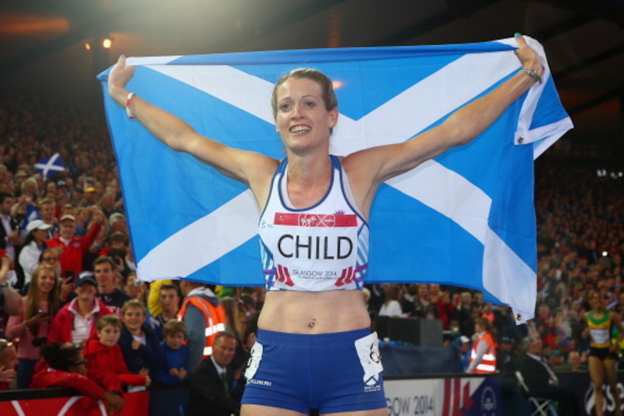 GLASGOW, SCOTLAND - JULY 31:  Eilidh Child of Scotland celebrates winning silver in the Women's 400 metres hurdles final at Hampden Park during day eight of the Glasgow 2014 Commonwealth Games on July 31, 2014 in Glasgow, United Kingdom.  (Photo by Paul G