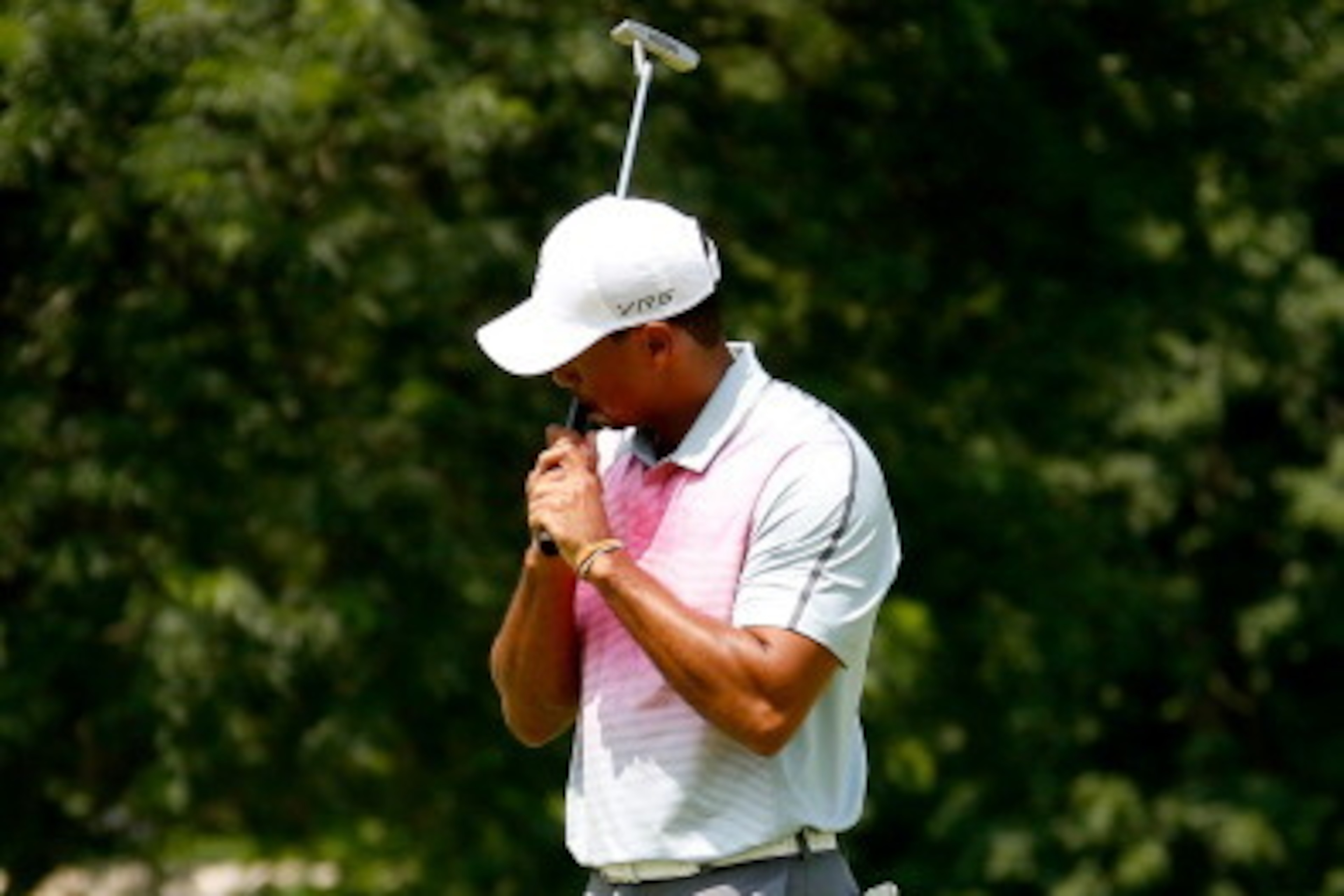 AKRON, OH - JULY 31:  Tiger Woods reacts to a missed par putt on the first green during the first round of the World Golf Championships-Bridgestone Invitational at Firestone Country Club South Course on July 31, 2014 in Akron, Ohio.  (Photo by Gregory Sha
