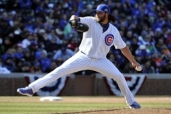 Apr 5, 2014; Chicago, IL, USA; Chicago Cubs relief pitcher James Russell (40) pitches against the Philadelphia Phillies during the eighth inning at Wrigley Field. Mandatory Credit: David Banks-USA TODAY Sports
