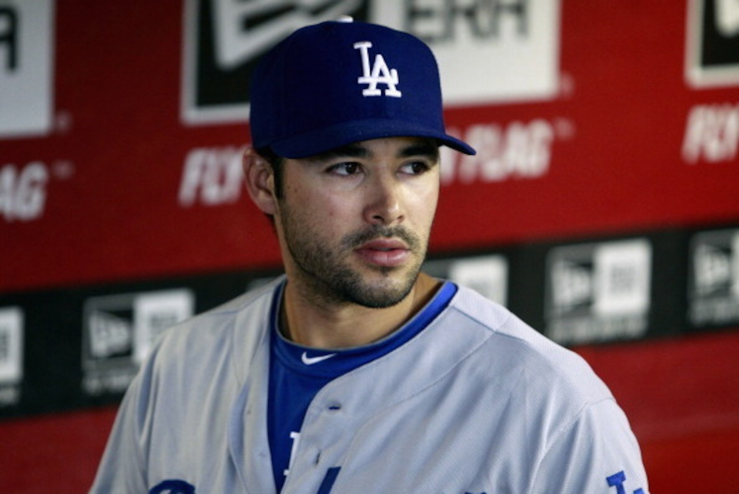 PHOENIX, AZ - MAY 18:  Andre Ethier #16 of the Los Angeles Dodgers looks on from the dugout during the start of a MLB game against the Arizona Diamondbacks at Chase Field on May 18, 2014 in Phoenix, Arizona.  (Photo by Ralph Freso/Getty Images)