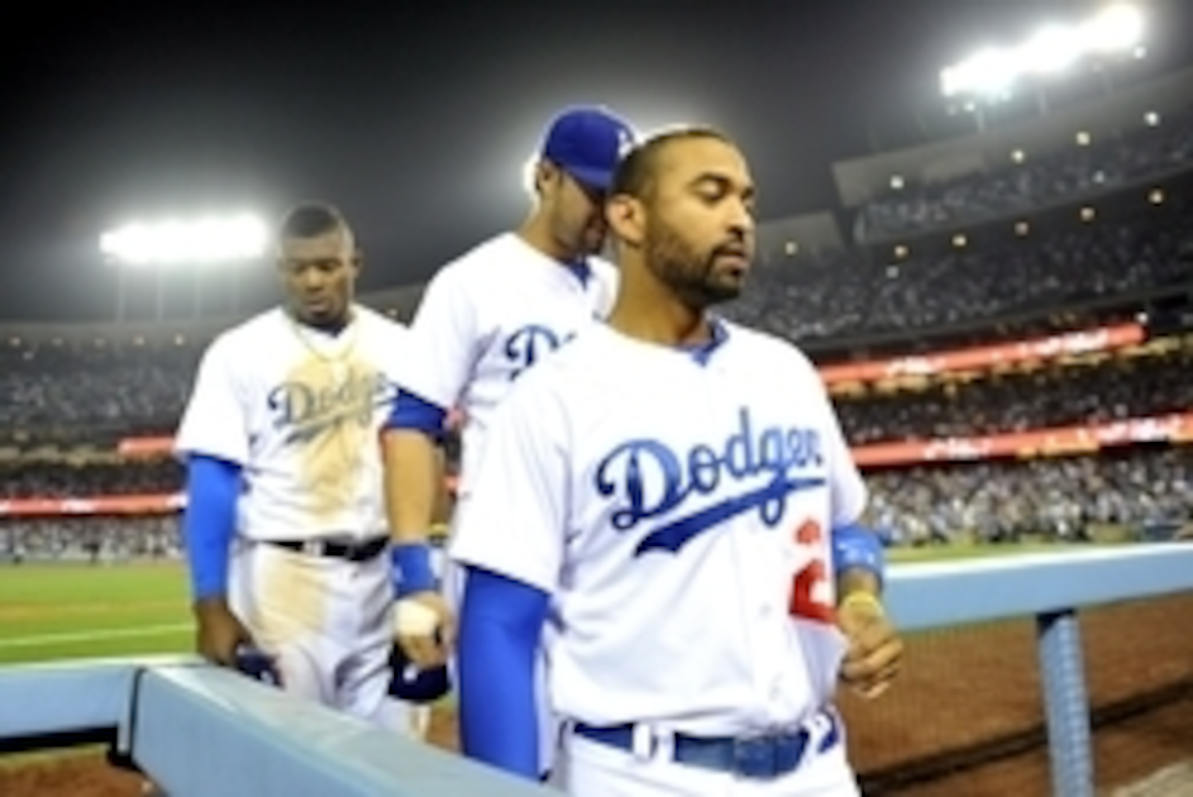 June 14, 2014; Los Angeles, CA, USA; Los Angeles Dodgers center fielder Matt Kemp (27), center fielder Andre Ethier (16) and right fielder Yasiel Puig (66) return to the dugout following the seventh inning against the Arizona Diamondbacks at Dodger Stadiu