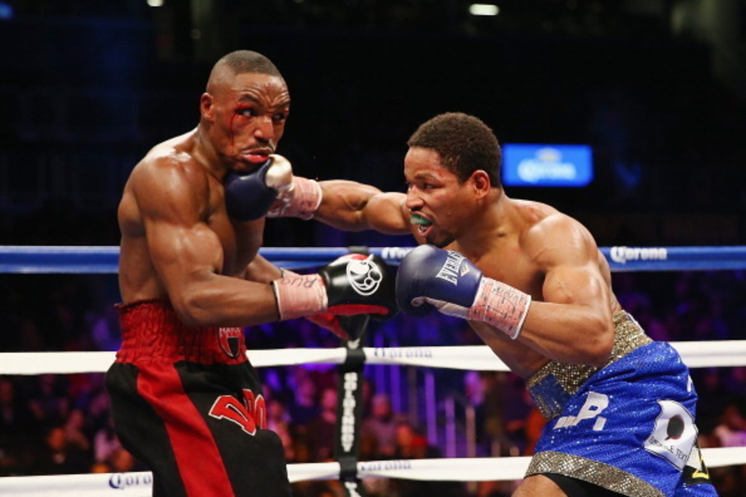 NEW YORK, NY - DECEMBER 07: Shawn Porter punches Devon Alexander during their IBF welterweight title fight at the Barclays Center on December 7, 2013 in the Brooklyn Borough of New York City. (Photo by Al Bello/Getty Images) NEW YORK, NY - DECEMBER 07: Shawn Porter punches Devon Alexander during their IBF welterweight title fight at the Barclays Center on December 7, 2013 in the Brooklyn Borough of New York City. (Photo by Al Bello/Getty Images)