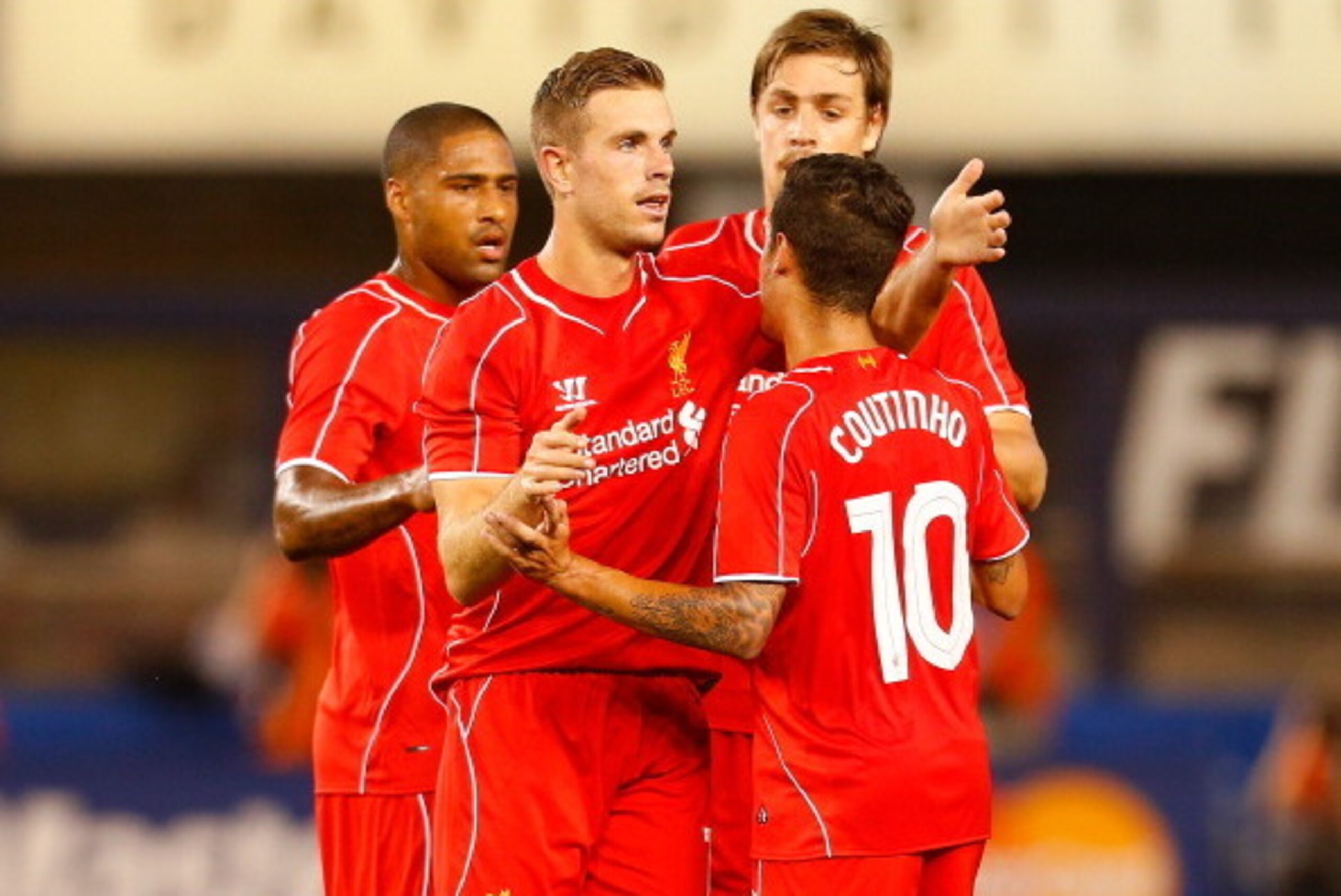 NEW YORK, NY - JULY 30:  Jordan Henderson #14 of Liverpool celebrates scoring a goal in the 59th minute against Manchester City during the International Champions Cup 2014 at Yankee Stadium on July 30, 2014 in the Bronx borough of New York City.  (Photo b