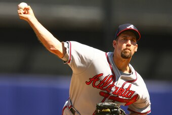 NEW YORK - APRIL 22:  John Smoltz #29 of the Atlanta Braves pitches against the New York Mets during their game at Shea Stadium April 22, 2007 in the Flushing neighborhood of the Queens borough of New York.  (Photo by Al Bello/Getty Images)