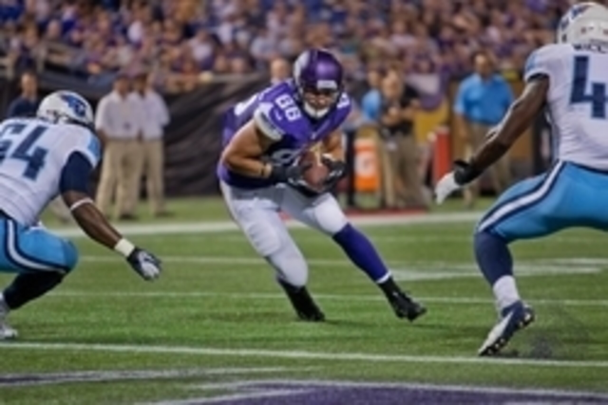 Aug 29, 2013; Minneapolis, MN, USA; Minnesota Vikings tight end Chase Ford (86) catches the ball before he fumbles it to the Tennessee Titans just before the goal line at Mall of America Field at H.H.H. Metrodome. The Titans recover the ball. Vikings win 