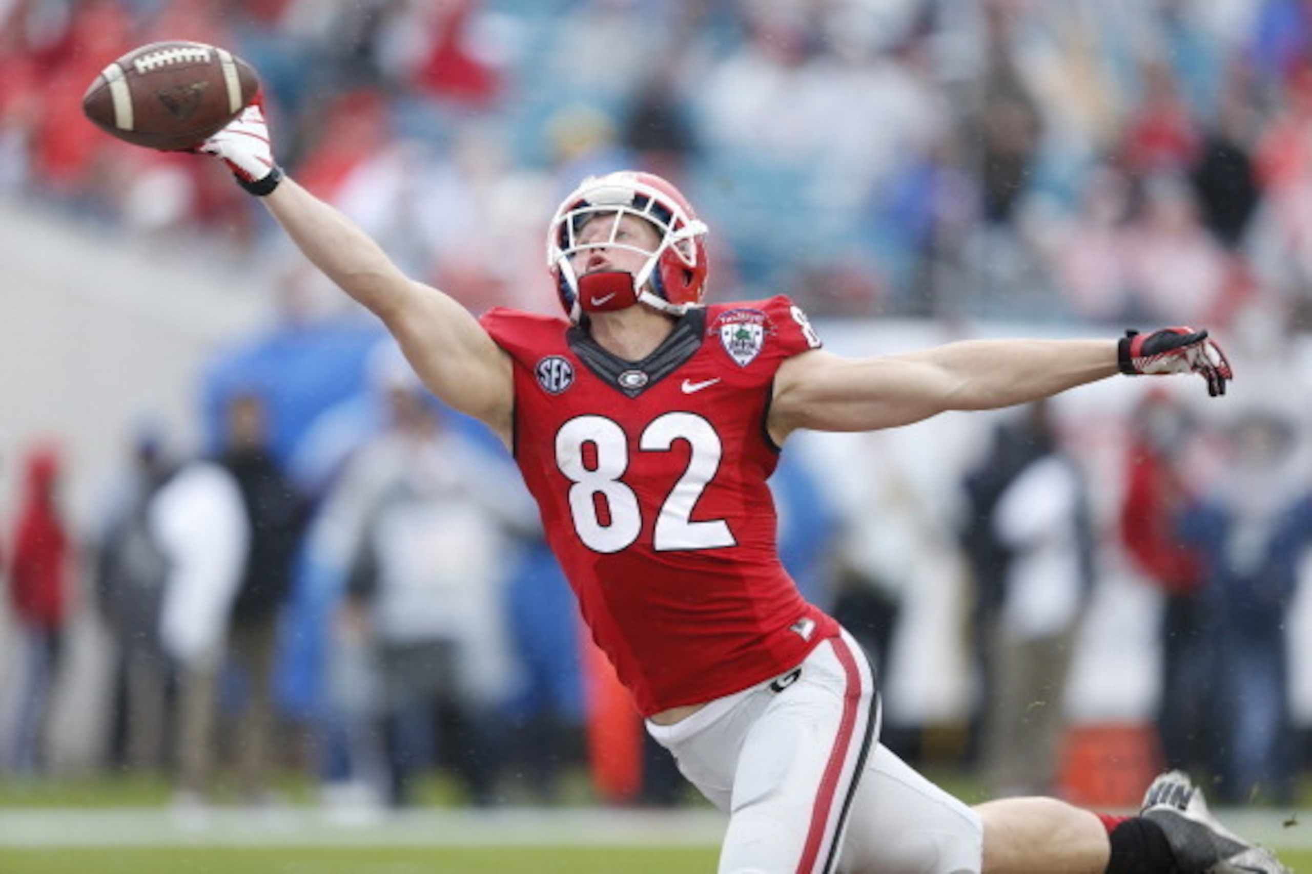 JACKSONVILLE, FL - JANUARY 1: Michael Bennett #82 of the Georgia Bulldogs has a pass sail just over his head in the end zone against the Nebraska Cornhuskers during the TaxSlayer.com Gator Bowl at Everbank Field on January 1, 2014 in Jacksonville, Florida