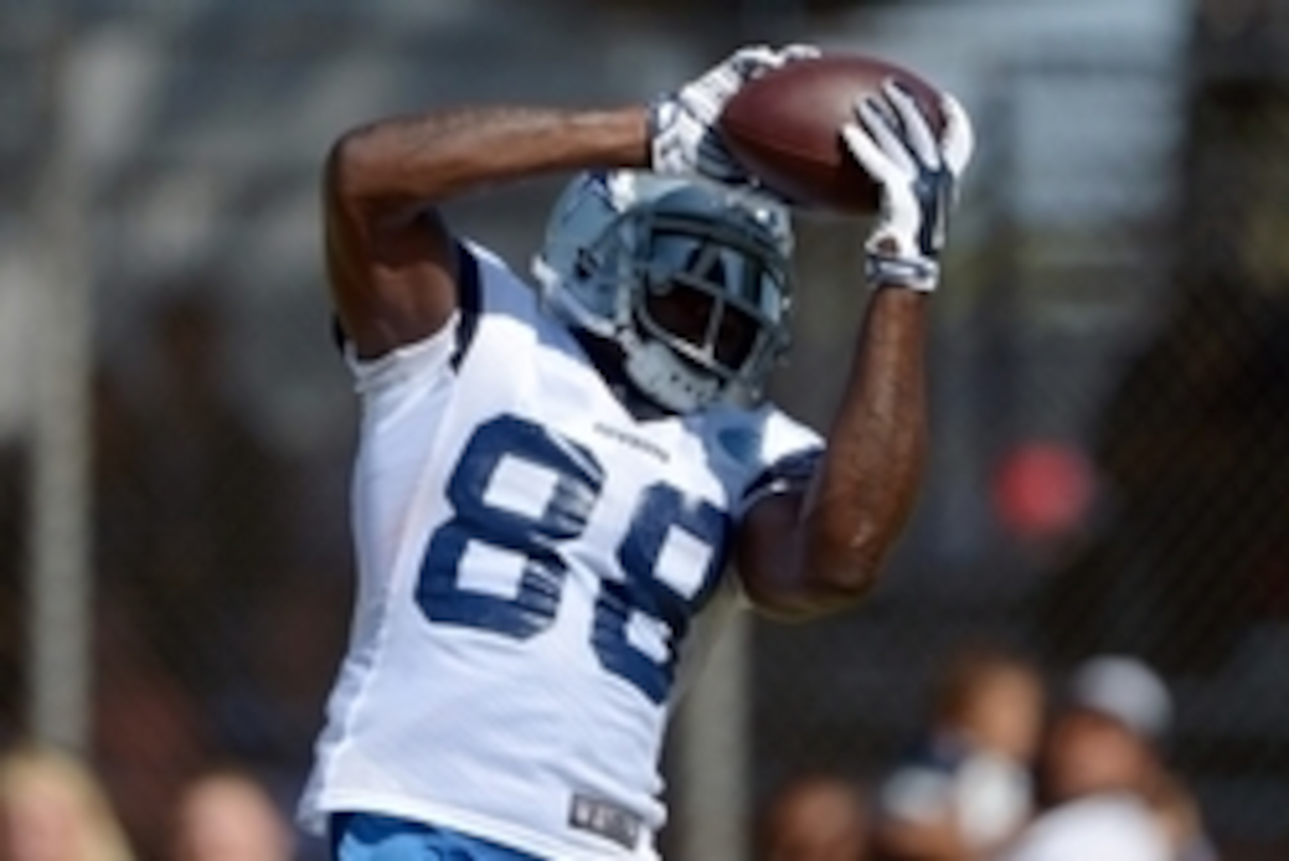 Jul 31, 2014; Oxnard, CA, USA; Dallas Cowboys receiver Dez Bryant (88) catches a pass at training camp at the River Ridge Fields. Mandatory Credit: Kirby Lee-USA TODAY Sports