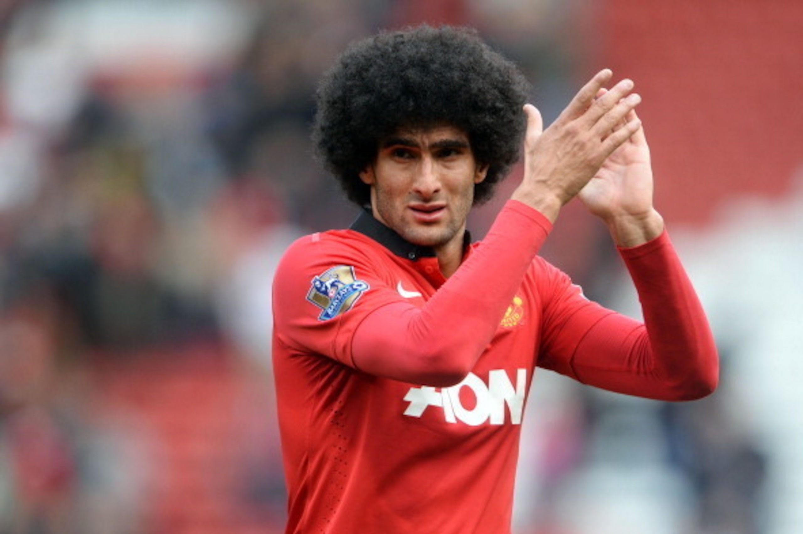 MANCHESTER, ENGLAND - SEPTEMBER 14: Marouane Fellaini of Manchester United applauds the crowd after the Barclays Premier League match between Manchester United and Crystal Palace at Old Trafford on September 14, 2013 in Manchester, England. (Photo by Mi MANCHESTER, ENGLAND - SEPTEMBER 14: Marouane Fellaini of Manchester United applauds the crowd after the Barclays Premier League match between Manchester United and Crystal Palace at Old Trafford on September 14, 2013 in Manchester, England. (Photo by Mi