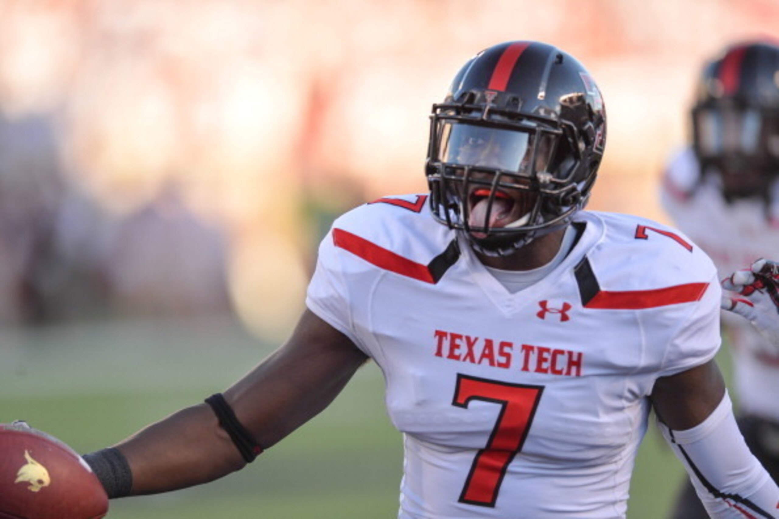LUBBOCK, TX - SEPTEMBER 21:  Will Smith #7 of the Texas Tech Red Raiders recovers a fumble and scores a touchdown against the Texas State Bobcats during game action on September 21, 2013 at AT&T Jones Stadium in Lubbock, Texas.  The Texas Tech Red Raiders