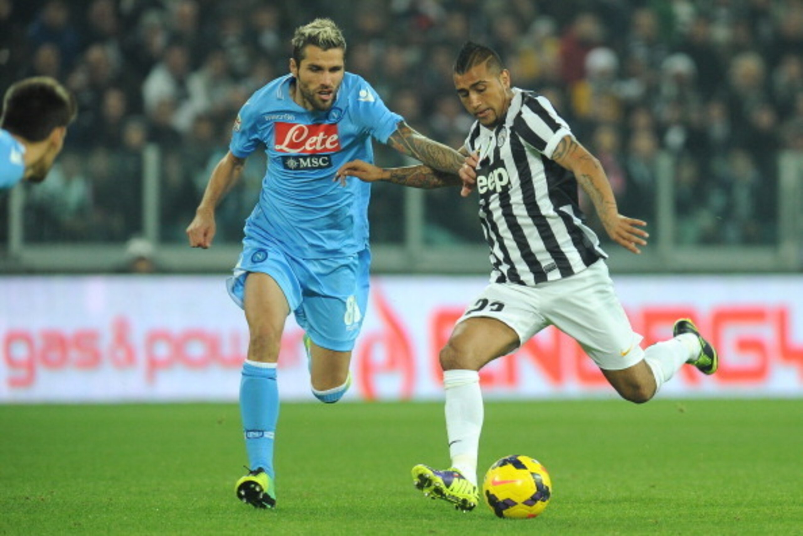 TURIN, ITALY - NOVEMBER 10: Arturo Vidal (R) of Juventus competes with Valon Behrami of SSC Napoli during the Serie A match between Juventus and SSC Napoli at Juventus Arena on November 10, 2013 in Turin, Italy. (Photo by Valerio Pennicino/Getty Images) TURIN, ITALY - NOVEMBER 10: Arturo Vidal (R) of Juventus competes with Valon Behrami of SSC Napoli during the Serie A match between Juventus and SSC Napoli at Juventus Arena on November 10, 2013 in Turin, Italy. (Photo by Valerio Pennicino/Getty Images)
