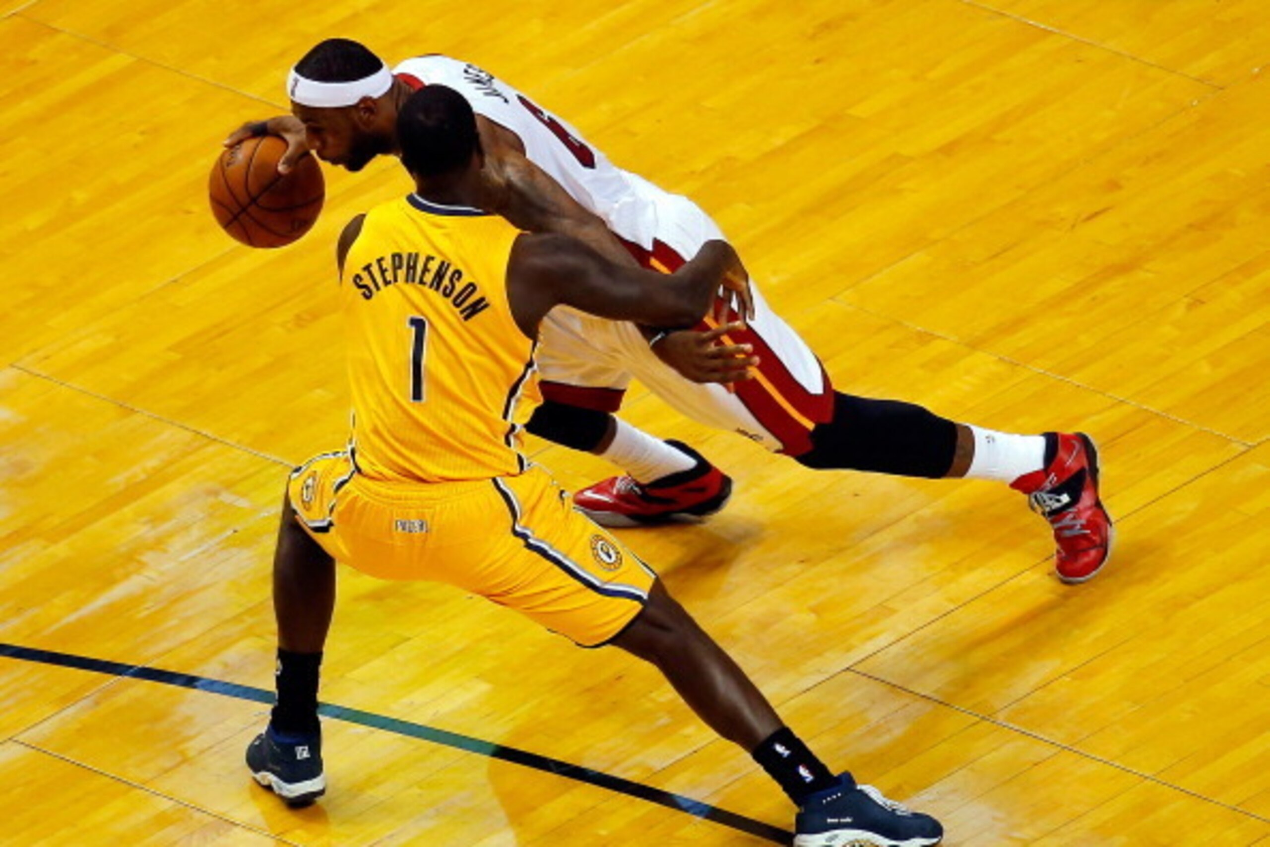 MIAMI, FL - MAY 30:  LeBron James #6 of the Miami Heat drives to the basket against Lance Stephenson #1 of the Indiana Pacers during Game Six of the Eastern Conference Finals of the 2014 NBA Playoffs at American Airlines Arena on May 30, 2014 in Miami, Fl