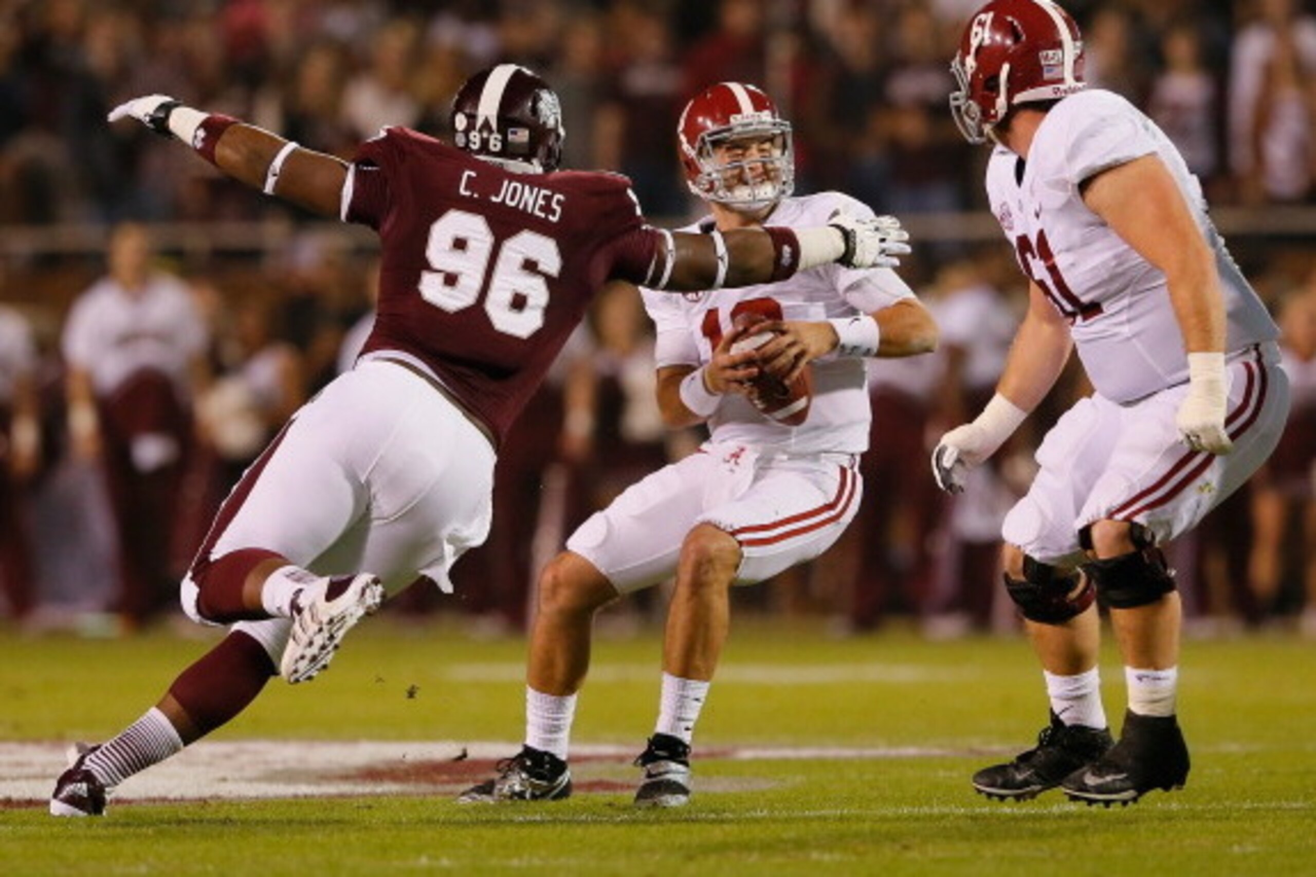 STARKVILLE, MS - NOVEMBER 16:  Chris Jones #96 of the Mississippi State Bulldogs sacks AJ McCarron #10 of the Alabama Crimson Tide at Davis Wade Stadium on November 16, 2013 in Starkville, Mississippi.  (Photo by Kevin C. Cox/Getty Images)