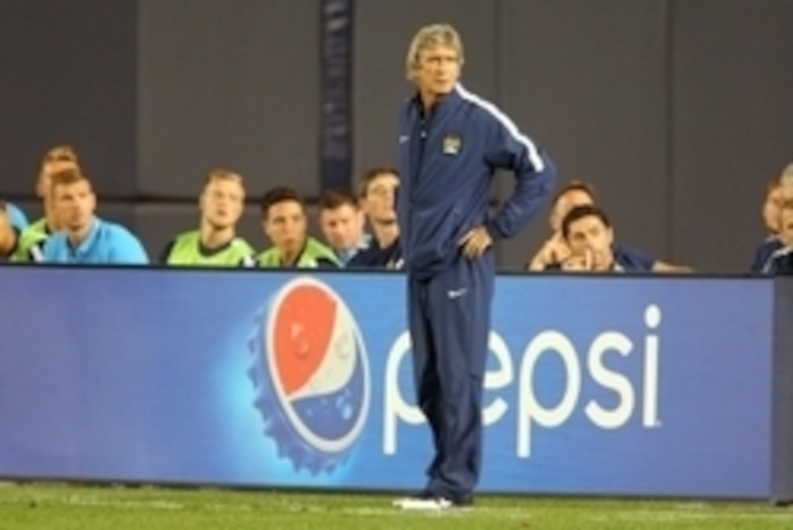 Jul 30, 2014; Bronx, NY, USA; Manchester City FC manager Manuel Pellegrini coaches during the second half of a game against Liverpool FC at Yankee Stadium. Mandatory Credit: Brad Penner-USA TODAY Sports