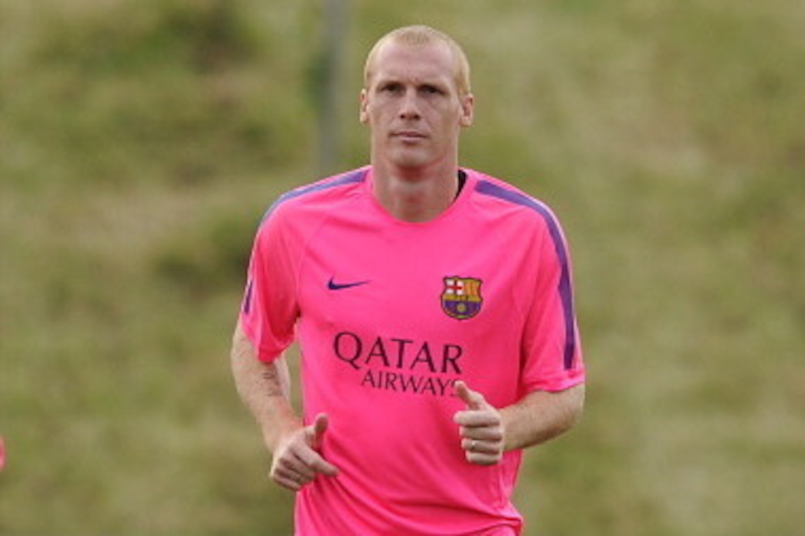 BURTON-UPON-TRENT, ENGLAND - JULY 28: Jeremy Mathieu of Barcelona warms up during the Barcelona Training Session at St George's Park on July 28, 2014 in Burton-upon-Trent, England. (Photo by Chris Brunskill/Getty Images)