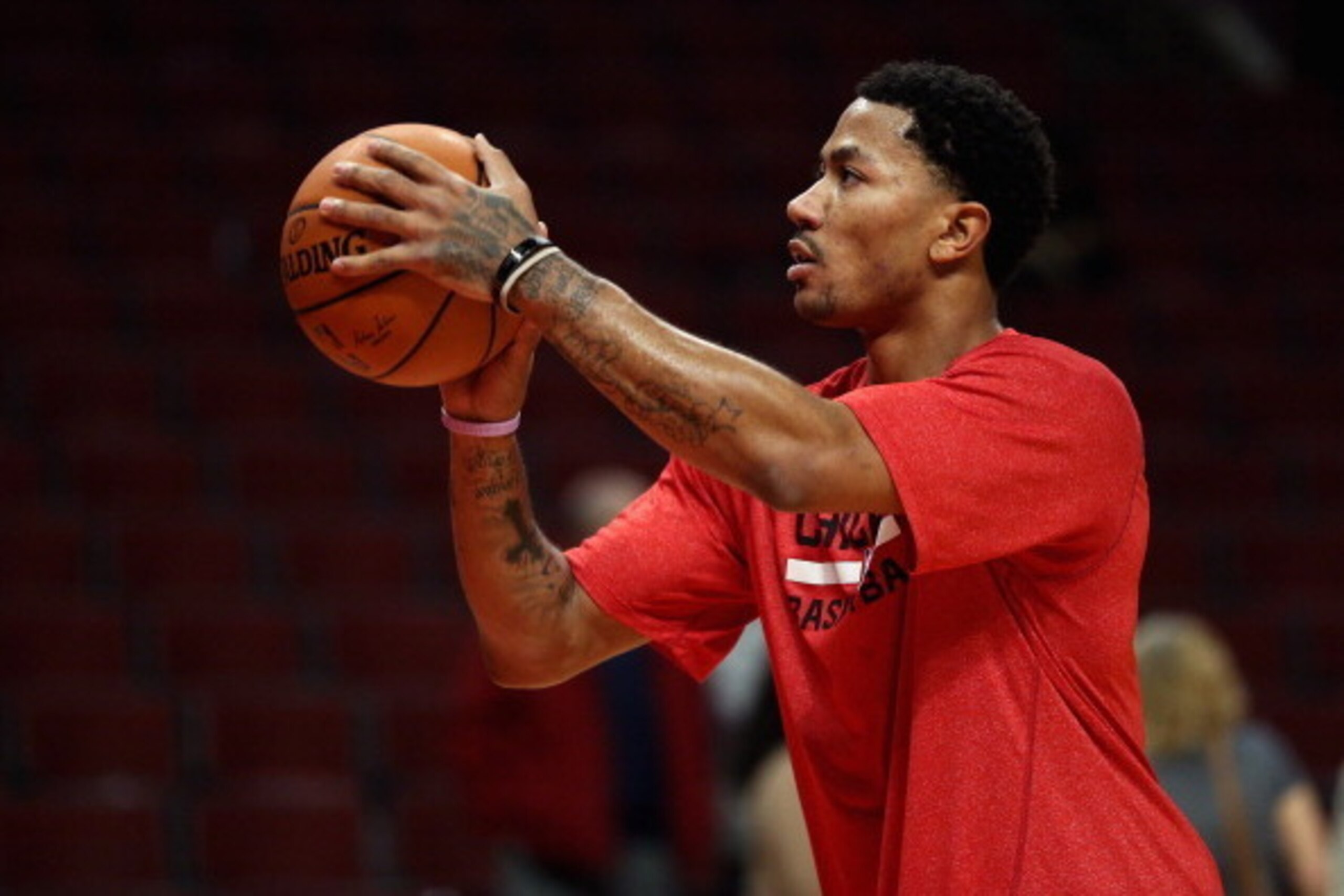 CHICAGO, IL - FEBRUARY 11:  Derrick Rose #1 of the Chicago Bulls, who suffered a season-ending knee injury in November, practices his shooting before the Bulls take on the Atlanta Hawks at the United Center on February 11, 2014 in Chicago, Illinois. NOTE
