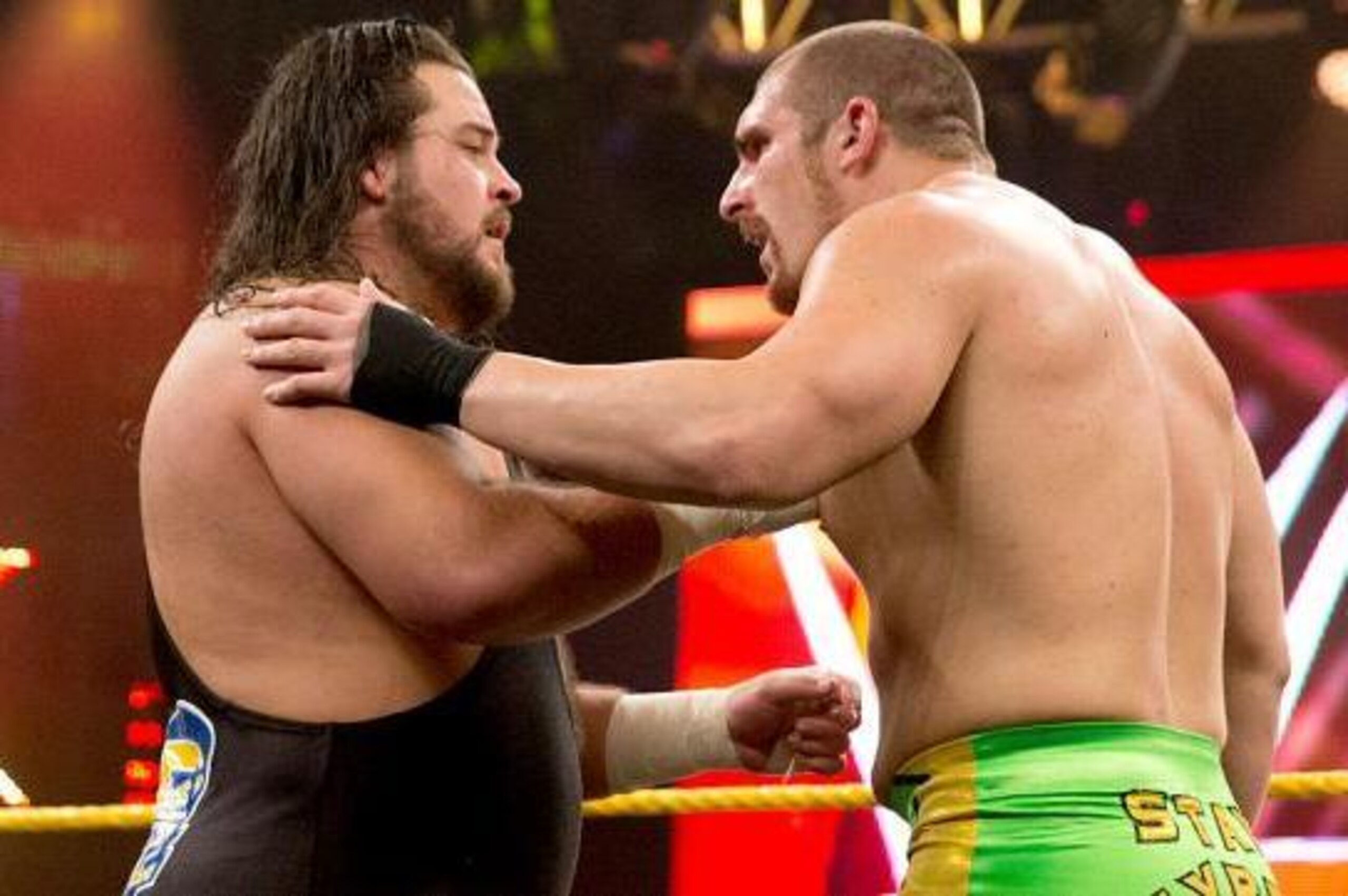 Bull Dempsey and Mojo Rawley talk after their match.