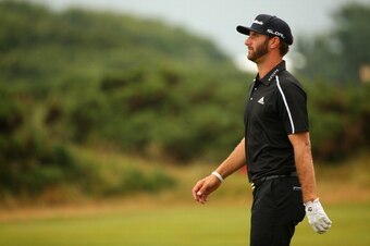 HOYLAKE, ENGLAND - JULY 19:  Dustin Johnson of the United States looks on during the third round of The 143rd Open Championship at Royal Liverpool on July 19, 2014 in Hoylake, England.  (Photo by Mike Ehrmann/Getty Images)