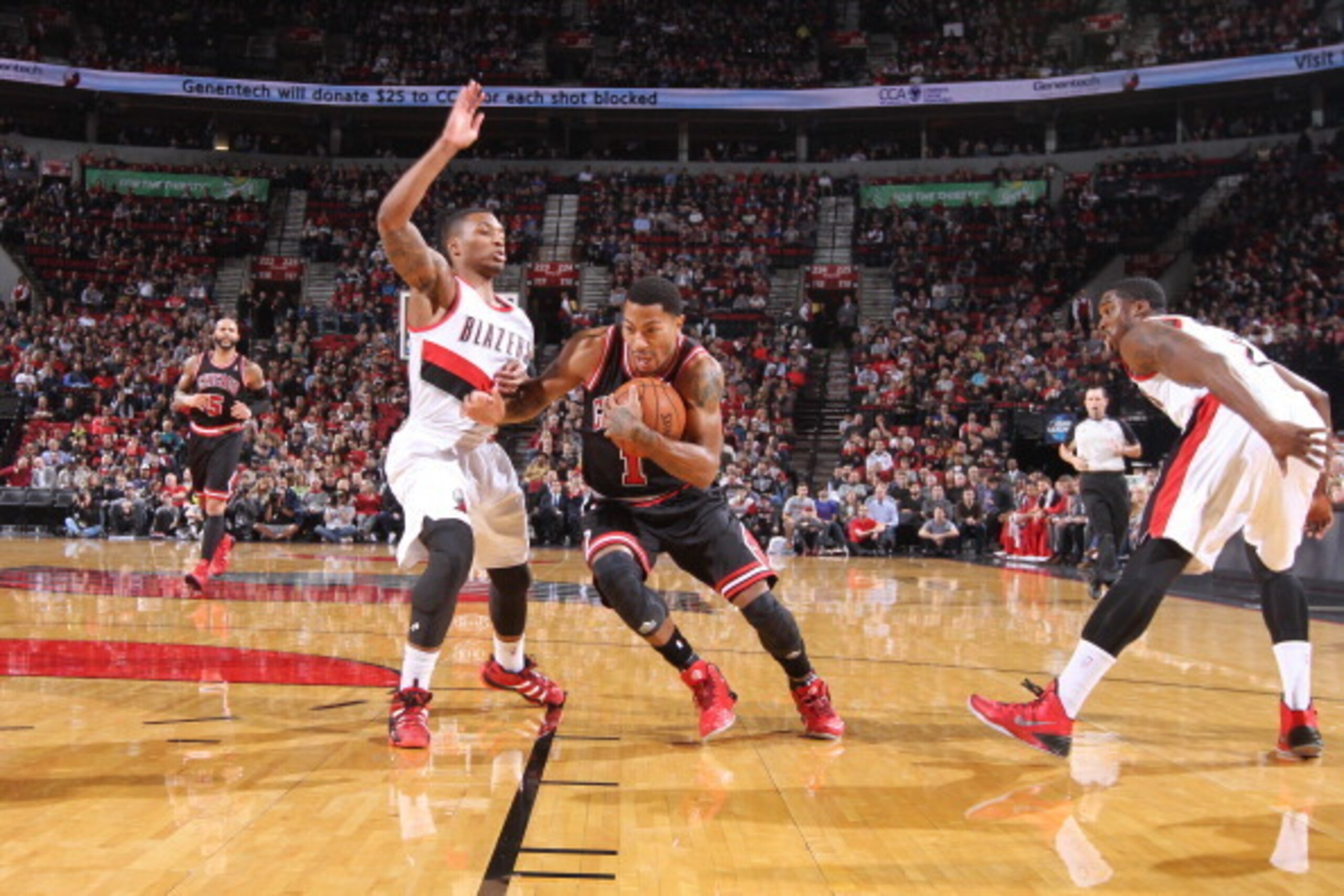 PORTLAND, OR - NOVEMBER 22:  Derrick Rose #1 of the Chicago Bulls drives to the basket against the Portland Trail Blazers on November 22, 2013 at the Moda Center Arena in Portland, Oregon. NOTE TO USER: User expressly acknowledges and agrees that, by down