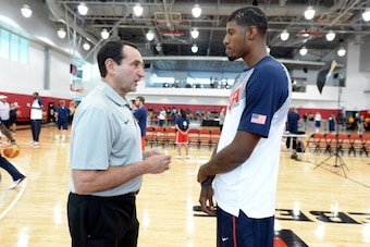 LAS VEGAS, NV - JULY 28: Head Coach Mike Krzyzewski and Paul George #29 of the USA Basketball Men's National Team converse during practice at the Mendenhall Center at the University of Nevada, Las Vegas on July 28, 2014 in Las Vegas, Nevada. NOTE TO USER: