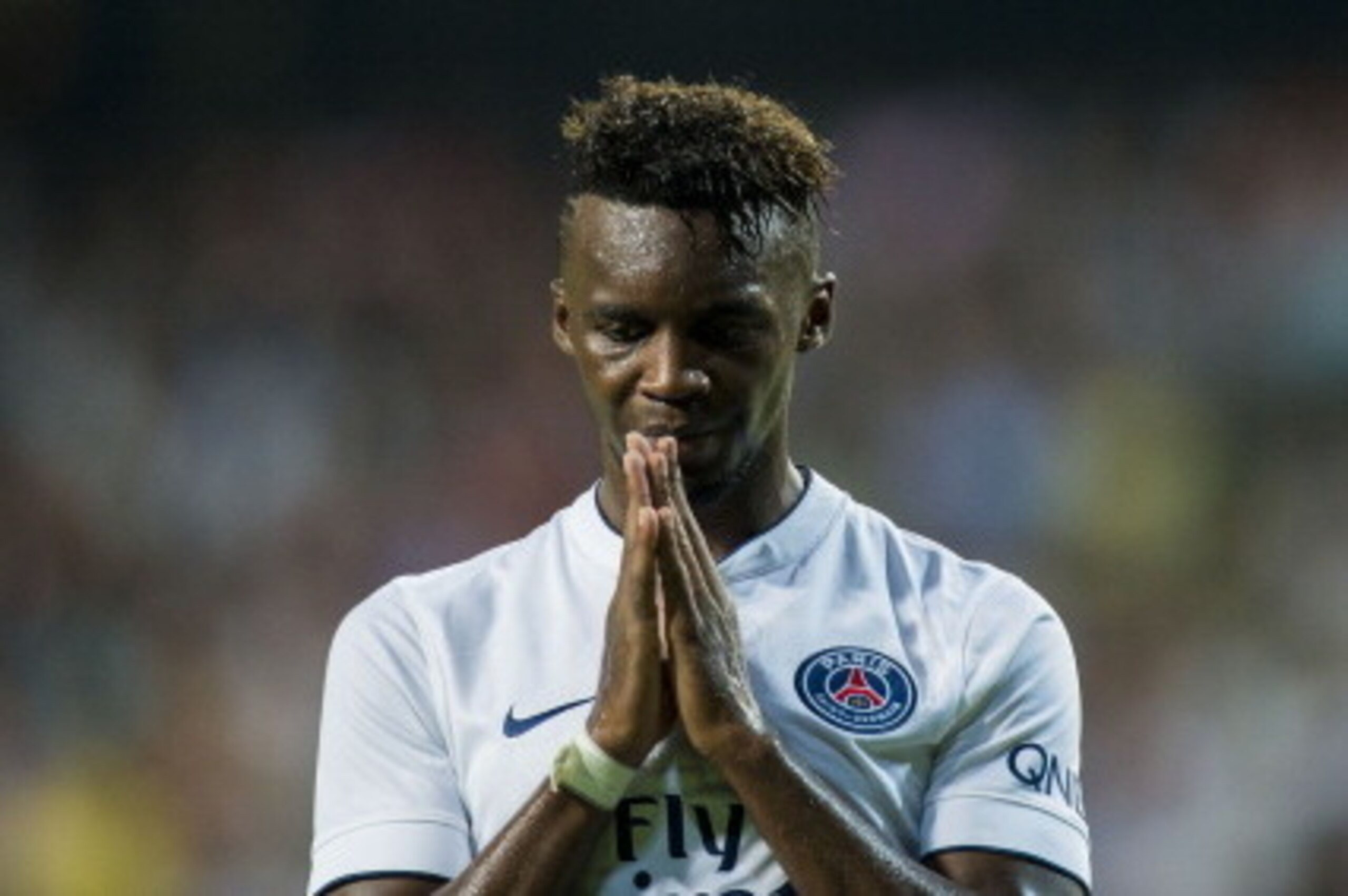 HONG KONG - JULY 29:  Jean-Christophe Bahebeck of Paris Saint-Germain reacts after missing an opportunity to score during the friendly match between Kitchee and Paris Saint-Germain at Hong Kong Stadium on July 29, 2014 in Hong Kong, Hong Kong.  (Photo by