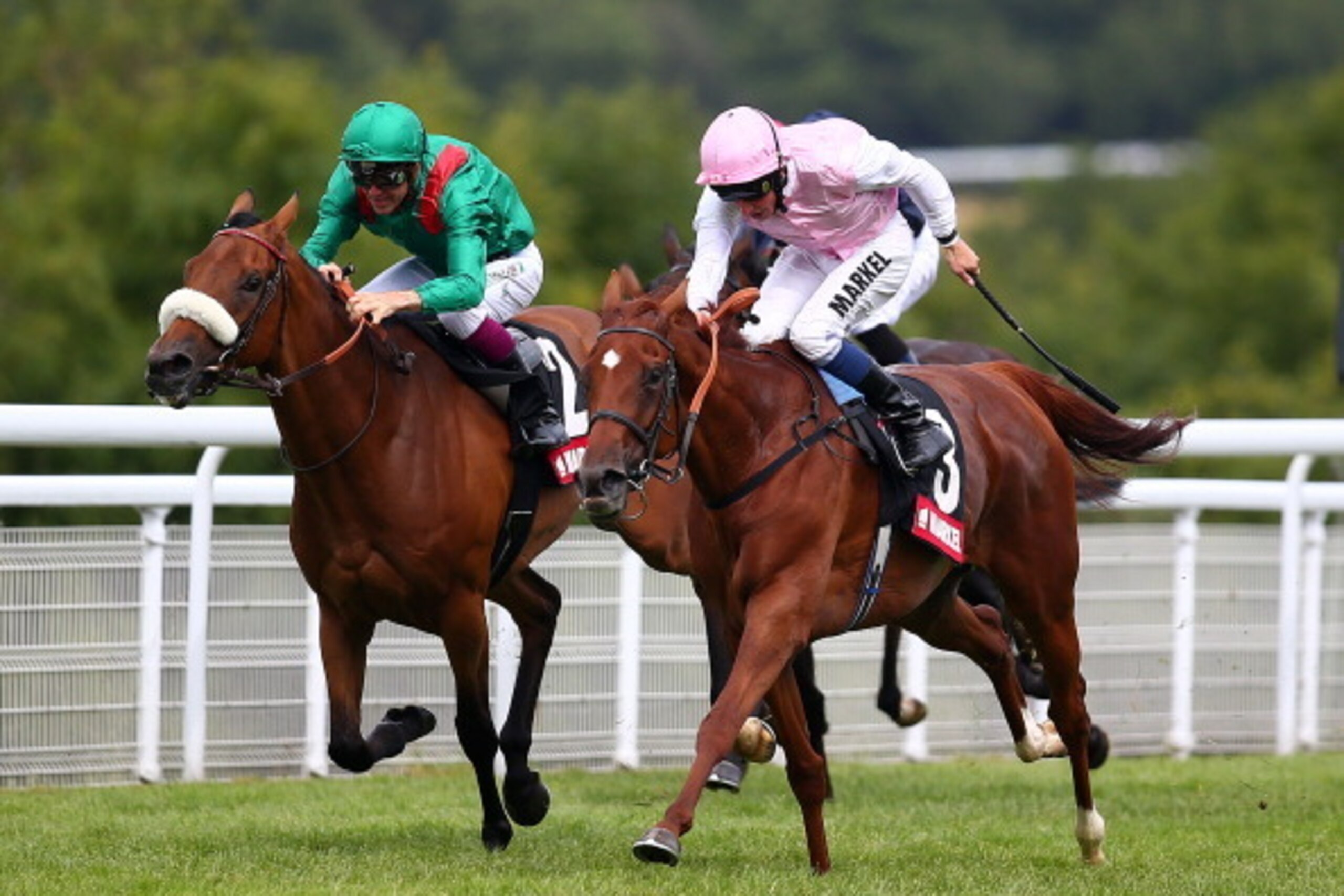 CHICHESTER, ENGLAND - AUGUST 02: William Buick; riding Sultanina (R) wins The Markel Insurance Nassau Stakes at Goodwood racecourse on August 02, 2014 in Chichester, England. (Photo by Charlie Crowhurst/Getty Images)