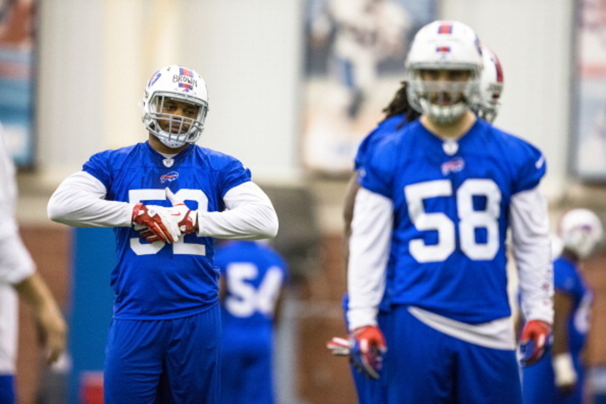 ORCHARD PARK, NY - May 18:  Preston Brown #52 of Buffalo Bills listens to coaching staff during the Buffalo Bills rookie minicamp on May 18, 2014 at Ralph Wilson Stadium in Orchard Park, New York.  (Photo by Brett Carlsen/Getty Images)