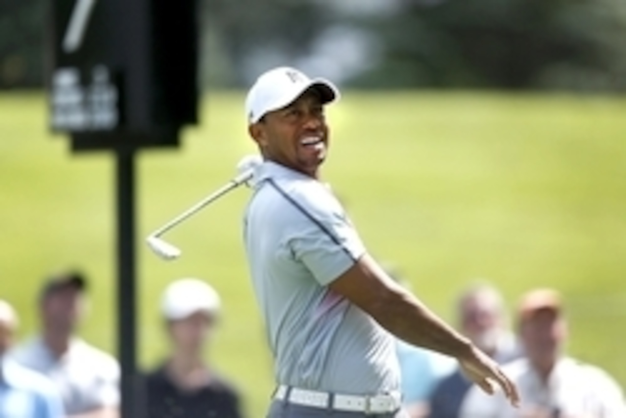 Jul 31, 2014; Akron, OH, USA; Tiger Woods reacts to his tee shot on the seventh hole during the first round of the WGC-Bridgestone Invitational golf tournament at Firestone Country Club - South Course. Mandatory Credit: Joe Maiorana-USA TODAY Sports Jul 31, 2014; Akron, OH, USA; Tiger Woods reacts to his tee shot on the seventh hole during the first round of the WGC-Bridgestone Invitational golf tournament at Firestone Country Club - South Course. Mandatory Credit: Joe Maiorana-USA TODAY Sports