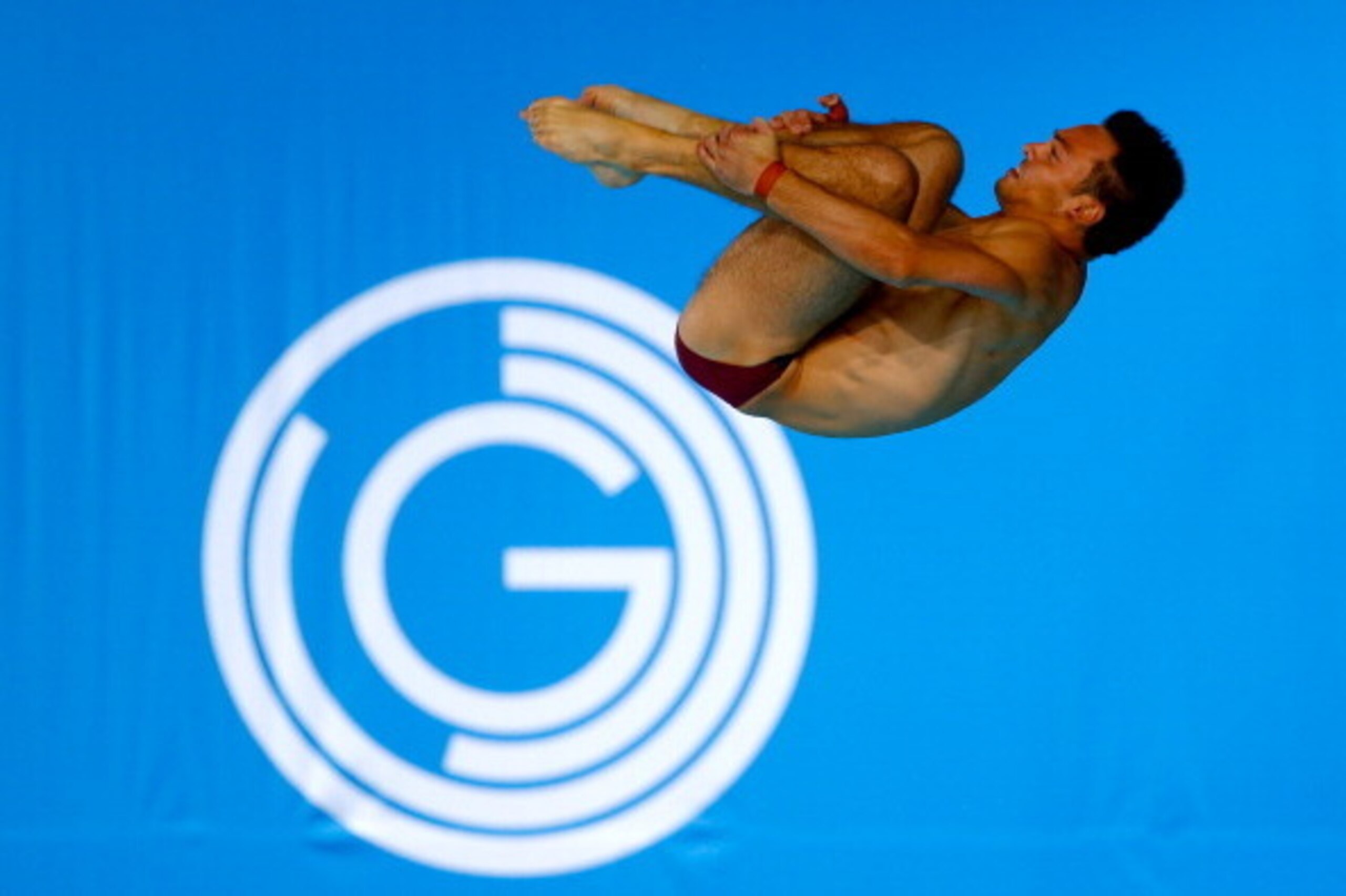 EDINBURGH, SCOTLAND - AUGUST 02:  Tom Daley of England competes in the Men's 10m Platform preliminaries at the Royal Commonwealth Pool during day ten of the Glasgow 2014 Commonwealth Games on August 2, 2014 in Edinburgh, United Kingdom.  (Photo by Clive R