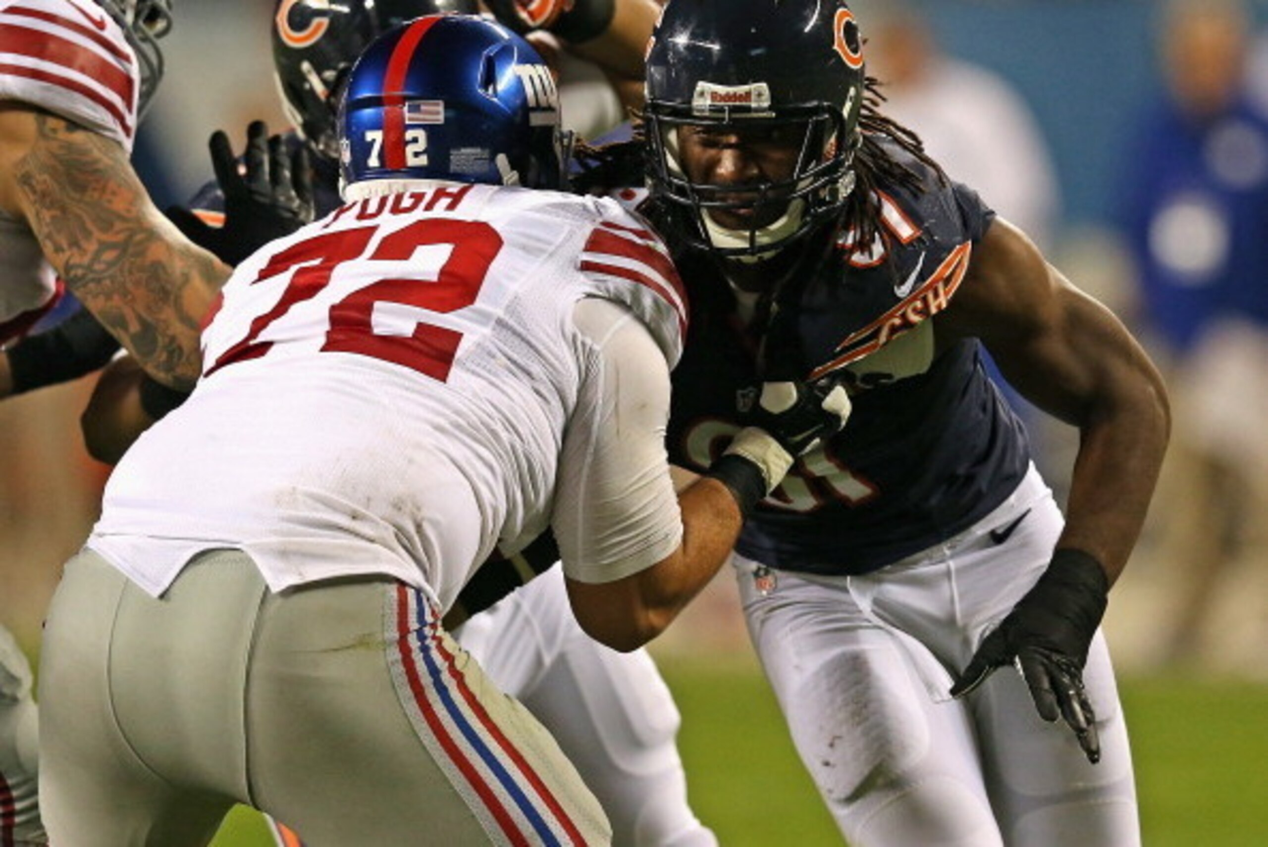 CHICAGO, IL - OCTOBER 10: David Bass #91 of the Chicago Bears rushes against Justin Pugh #72 of the New York Giants at Soldier Field on October 10, 2013 in Chicago, Illinois. The Bears defeated the Giants 27-21. (Photo by Jonathan Daniel/Getty Images) CHICAGO, IL - OCTOBER 10: David Bass #91 of the Chicago Bears rushes against Justin Pugh #72 of the New York Giants at Soldier Field on October 10, 2013 in Chicago, Illinois. The Bears defeated the Giants 27-21. (Photo by Jonathan Daniel/Getty Images)