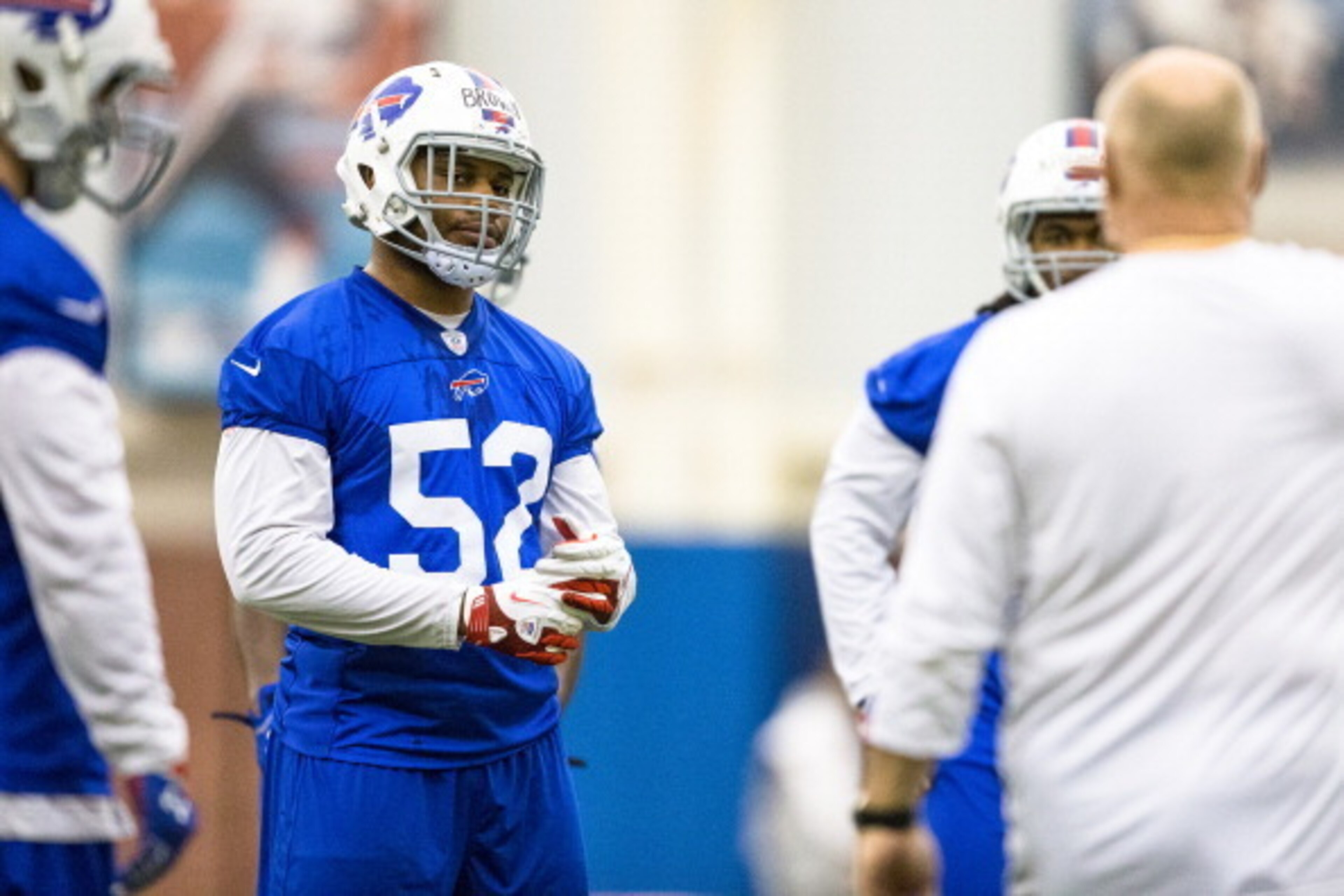 ORCHARD PARK, NY - May 18:  Preston Brown #52 of Buffalo Bills listens to coaching staff during the Buffalo Bills rookie minicamp on May 18, 2014 at Ralph Wilson Stadium in Orchard Park, New York.  (Photo by Brett Carlsen/Getty Images)