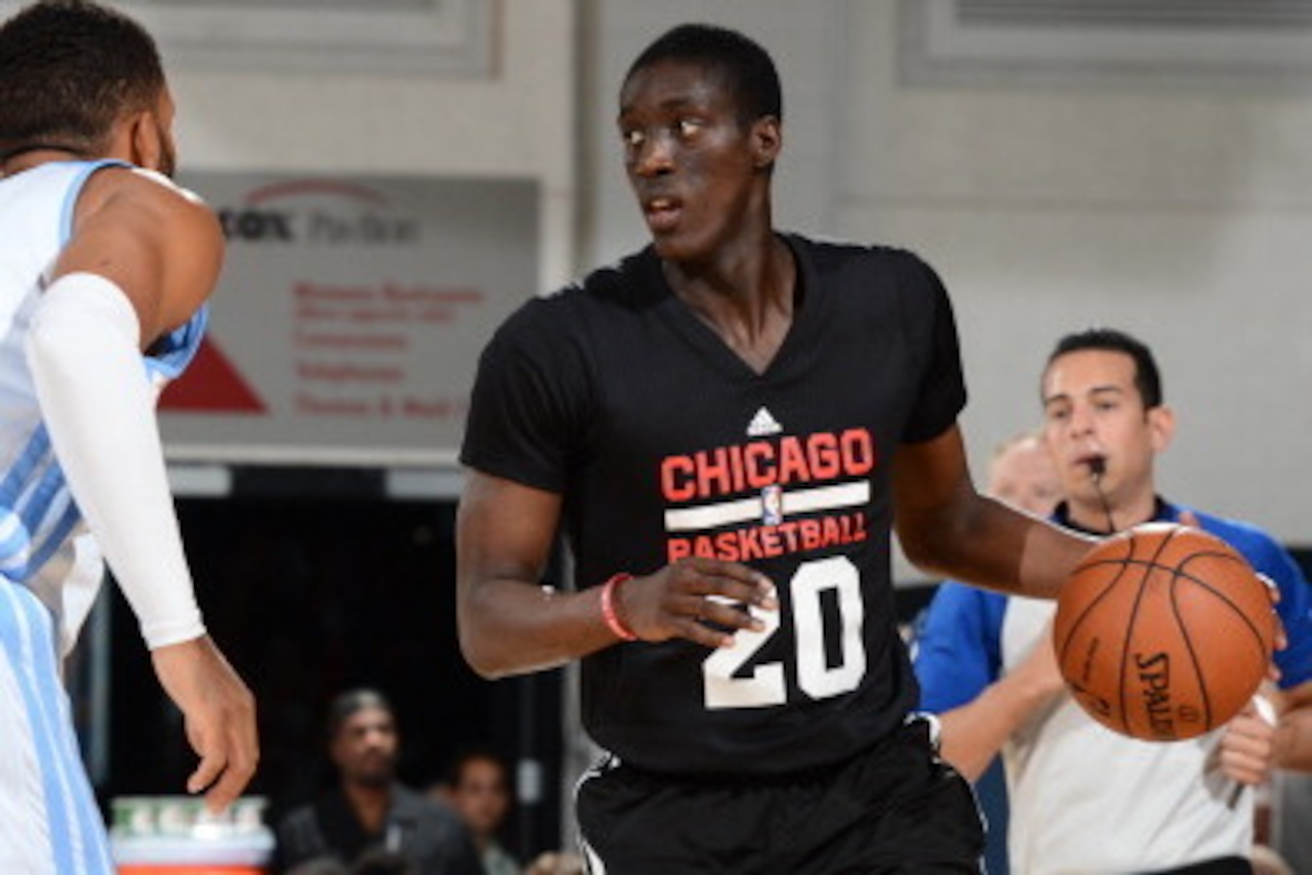 LAS VEGAS, NV - JULY 13:  Tony Snell #20 of the Chicago Bulls handles the ball against the Denver Nuggets at the Samsung NBA Summer League 2014 on July 13, 2014 at the Cox Pavilion in Las Vegas, Nevada. NOTE TO USER: User expressly acknowledges and agrees