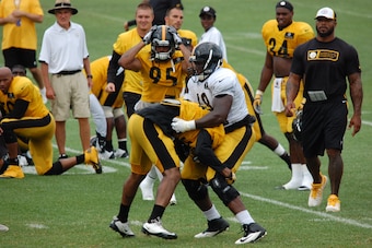 Kelvin Beachum and Chris Carter engaged in the second fight of training camp.