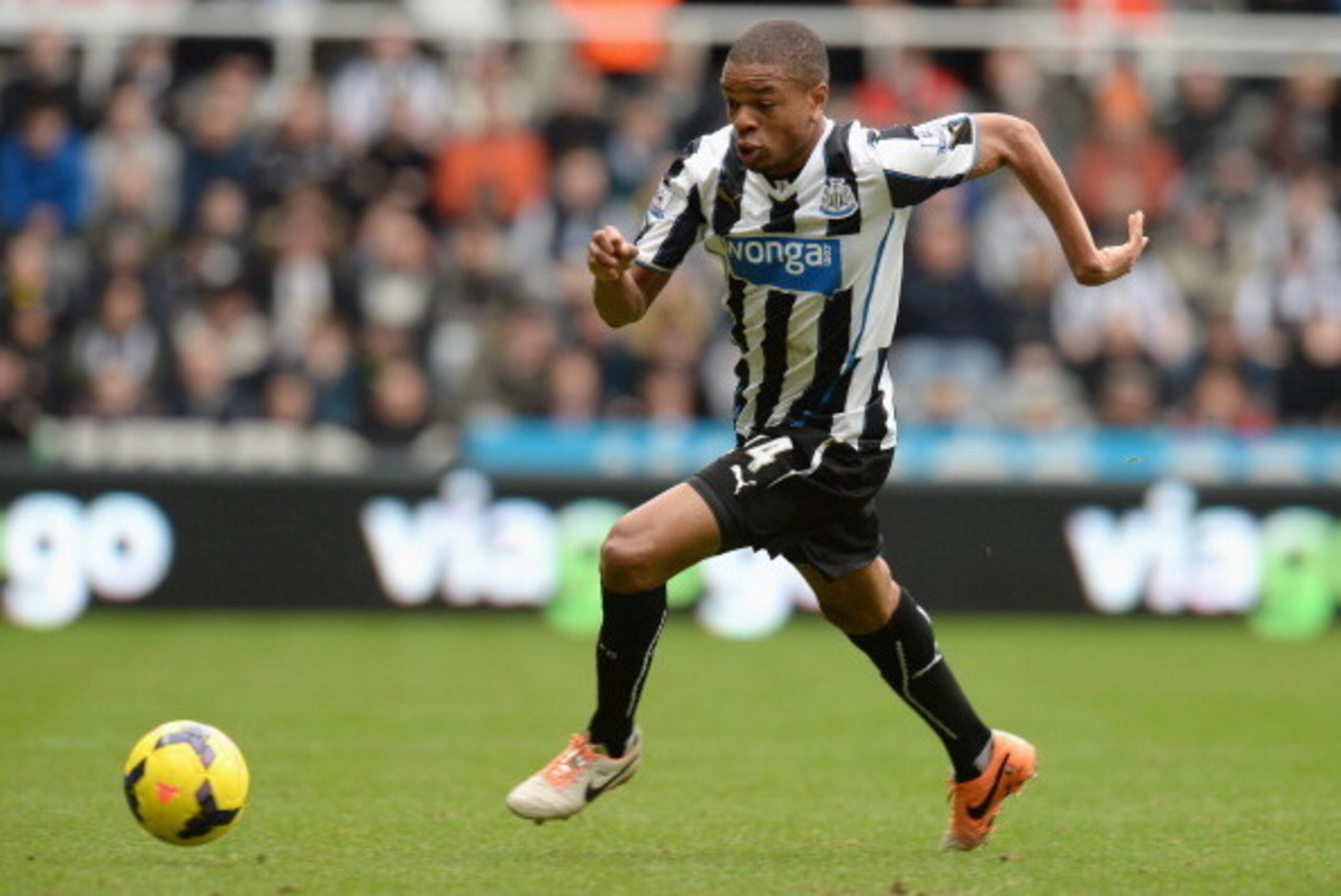 NEWCASTLE UPON TYNE, ENGLAND - FEBRUARY 23:  Loic Remy of Newcastle United runs with the ball during the Barclays Premier League match between Newcastle United and Aston Villa at St James' Park on February 23, 2014 in Newcastle upon Tyne, England.  (Photo