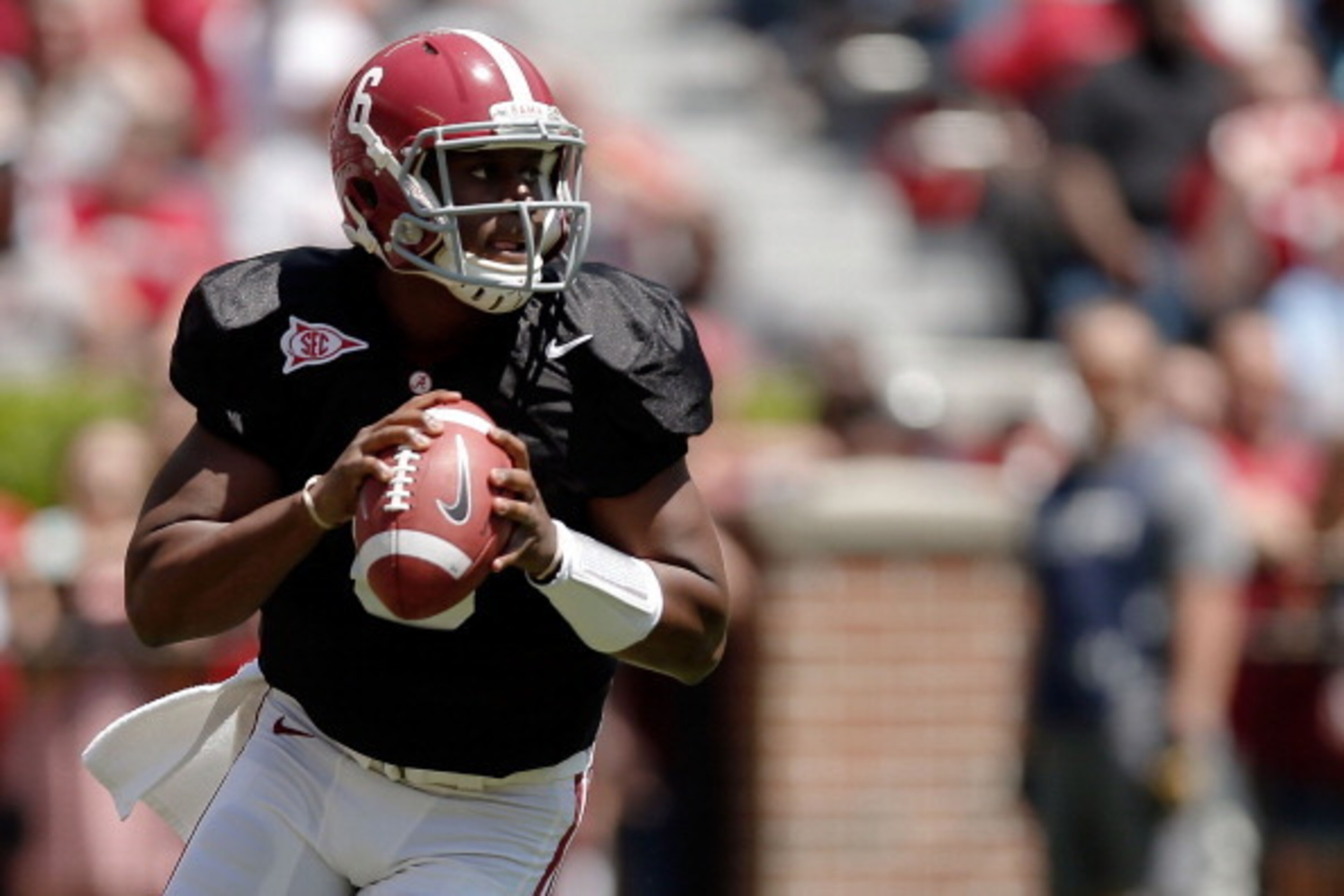TUSCALOOSA, AL - APRIL 19:  Blake Sims #6 of the Crimson team drops back to pass against the White team during the University of Alabama A-Day spring game at Bryant-Denny Stadium on April 19, 2014 in Tuscaloosa, Alabama.  (Photo by Stacy Revere/Getty Imag