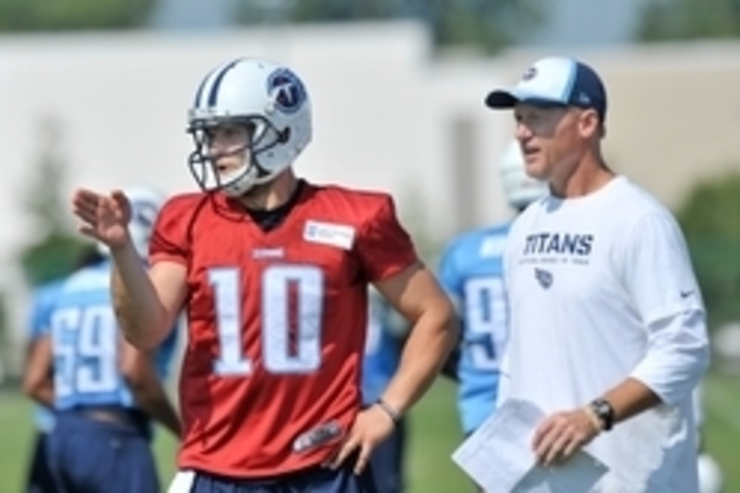 Jul 26, 2014; Nashville, TN, USA; Tennessee Titans quarterback Jake Locker (10) talks with head coach Ken Whisenhunt during training camp at Saint Thomas Sports Park. Mandatory Credit: Jim Brown-USA TODAY Sports Jul 26, 2014; Nashville, TN, USA; Tennessee Titans quarterback Jake Locker (10) talks with head coach Ken Whisenhunt during training camp at Saint Thomas Sports Park. Mandatory Credit: Jim Brown-USA TODAY Sports