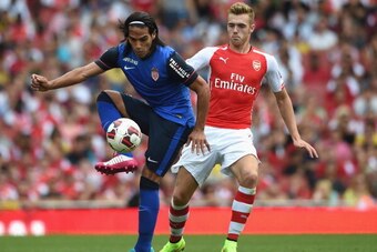 LONDON, ENGLAND - AUGUST 03:  Radamel Falcao of Monaco in action with Calum Chambers during the Emirates Cup match between Arsenal and AS Monaco at the Emirates Stadium on August 3, 2014 in London, England.  (Photo by Michael Regan/Getty Images)