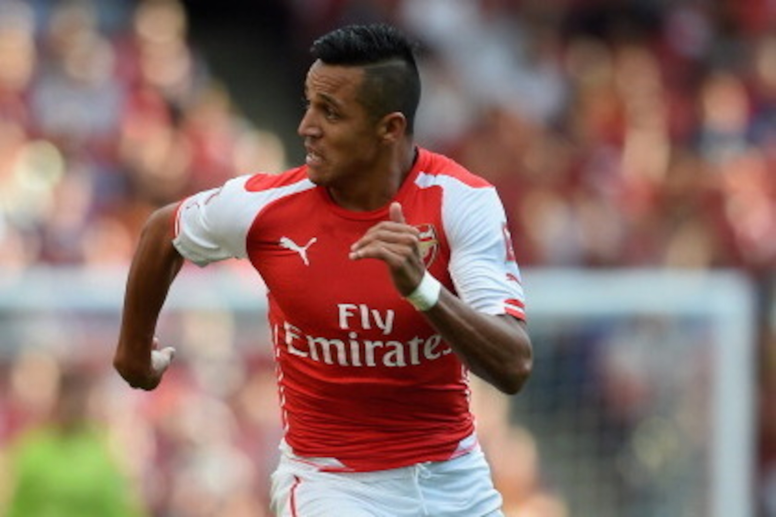 LONDON, ENGLAND - AUGUST 02:  Alexis Sanchez of Arsenal in action during the Emirates Cup match between Arsenal and Benfica at the Emirates Stadium on August 2, 2014 in London, England.  (Photo by Michael Regan/Getty Images)