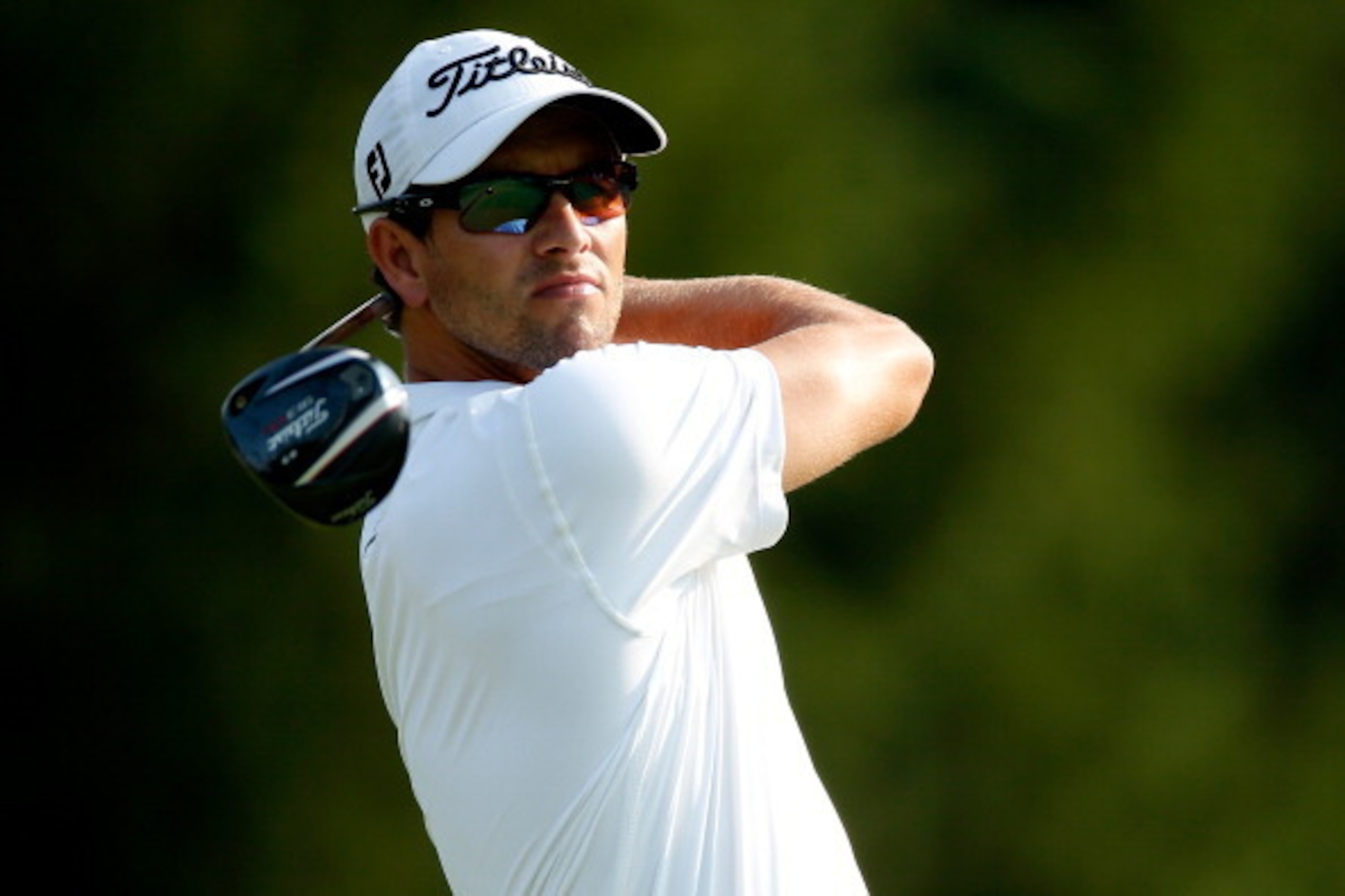AKRON, OH - AUGUST 02:  Adam Scott of Australia hits off the fourth tee during the third round of the World Golf Championships-Bridgestone Invitational at Firestone Country Club South Course on August 2, 2014 in Akron, Ohio.  (Photo by Gregory Shamus/Gett