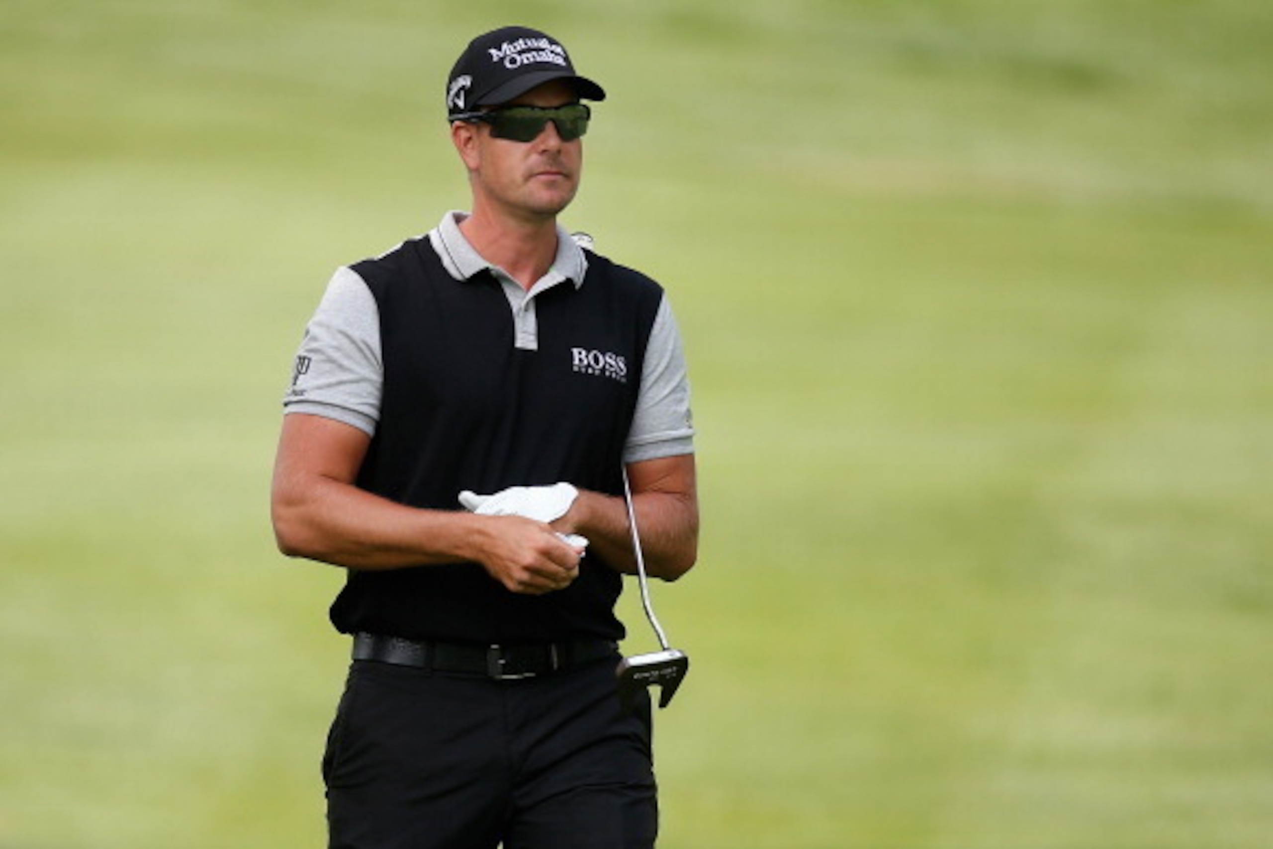 AKRON, OH - JULY 30:  Henrik Stenson of Sweden walks to the green during a practice round for the World Golf Championships-Bridgestone Invitational at Firestone Country Club South Course on July 30, 2014 in Akron, Ohio.  (Photo by Gregory Shamus/Getty Ima
