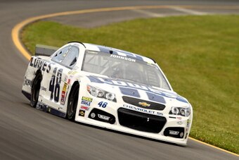 LONG POND, PA - AUGUST 03:  Jimmie Johnson, driver of the #48 Lowe's Chevrolet, races during the NASCAR Sprint Cup Series GoBowling.com 400 at Pocono Raceway on August 3, 2014 in Long Pond, Pennsylvania.  (Photo by Elsa/Getty Images)