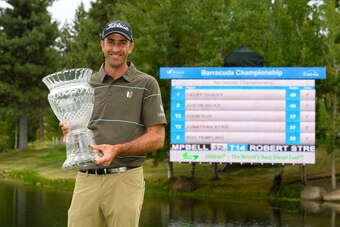 RENO, NV - AUGUST 03:  Geoff Ogilvy of Australia poses with the winner's trophy after winning the Barracuda Championship at the Montreux Golf and Country Club on August 3, 2014 in Reno, Nevada.  (Photo by Robert Laberge/Getty Images)