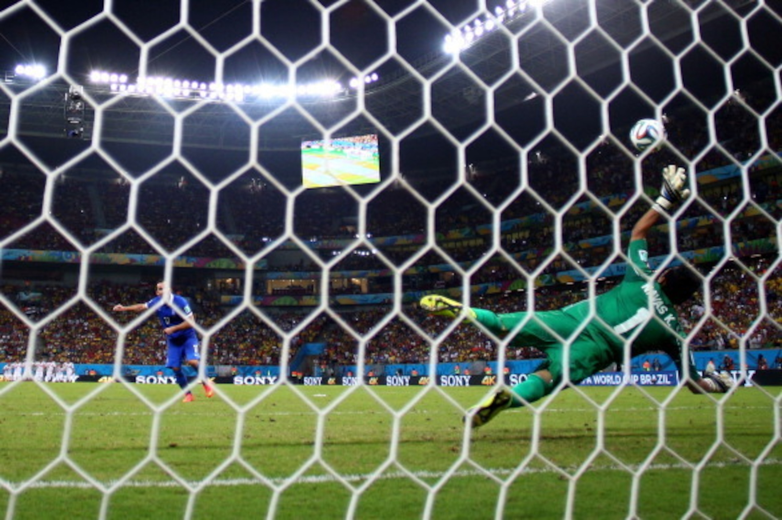 RECIFE, BRAZIL - JUNE 29: Theofanis Gekas of Greece has his penalty kick saved by Keylor Navas of Costa Rica during a shootout in the 2014 FIFA World Cup Brazil Round of 16 match between Costa Rica and Greece at Arena Pernambuco on June 29, 2014 in Recif RECIFE, BRAZIL - JUNE 29: Theofanis Gekas of Greece has his penalty kick saved by Keylor Navas of Costa Rica during a shootout in the 2014 FIFA World Cup Brazil Round of 16 match between Costa Rica and Greece at Arena Pernambuco on June 29, 2014 in Recif