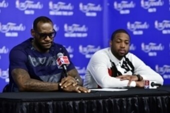 Jun 15, 2014; San Antonio, TX, USA; Miami Heat forward LeBron James (6) and guard Dwyane Wade (3) speak during a press conference after game five of the 2014 NBA Finals at AT&T Center. Mandatory Credit: Bob Donnan-USA TODAY Sports