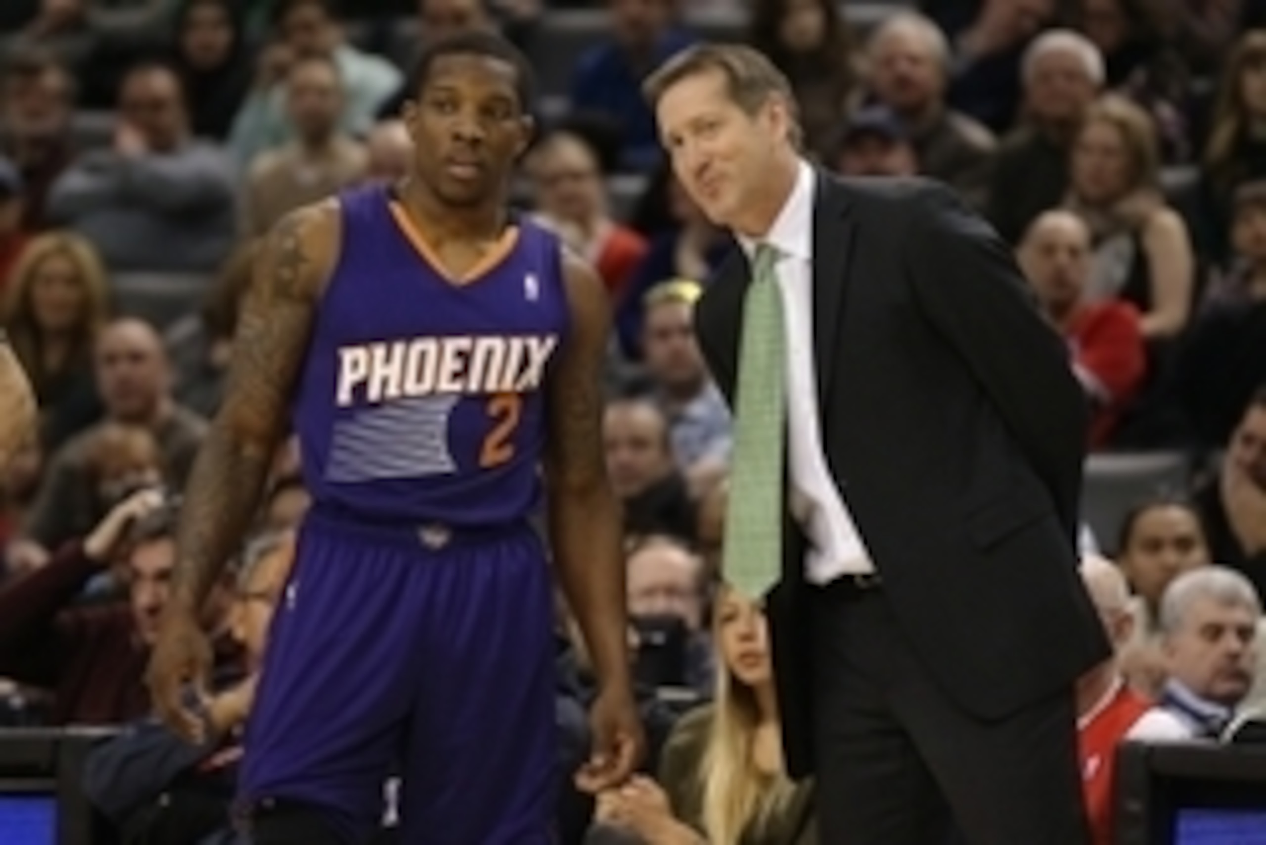 Mar 16, 2014; Toronto, Ontario, CAN; Phoenix Suns point guard Eric Bledsoe (2) listens to head coach Jeff Hornacek on the sideline against the Toronto Raptors at Air Canada Centre. The Suns beat the Raptors 121-113. Mandatory Credit: Tom Szczerbowski-USA 